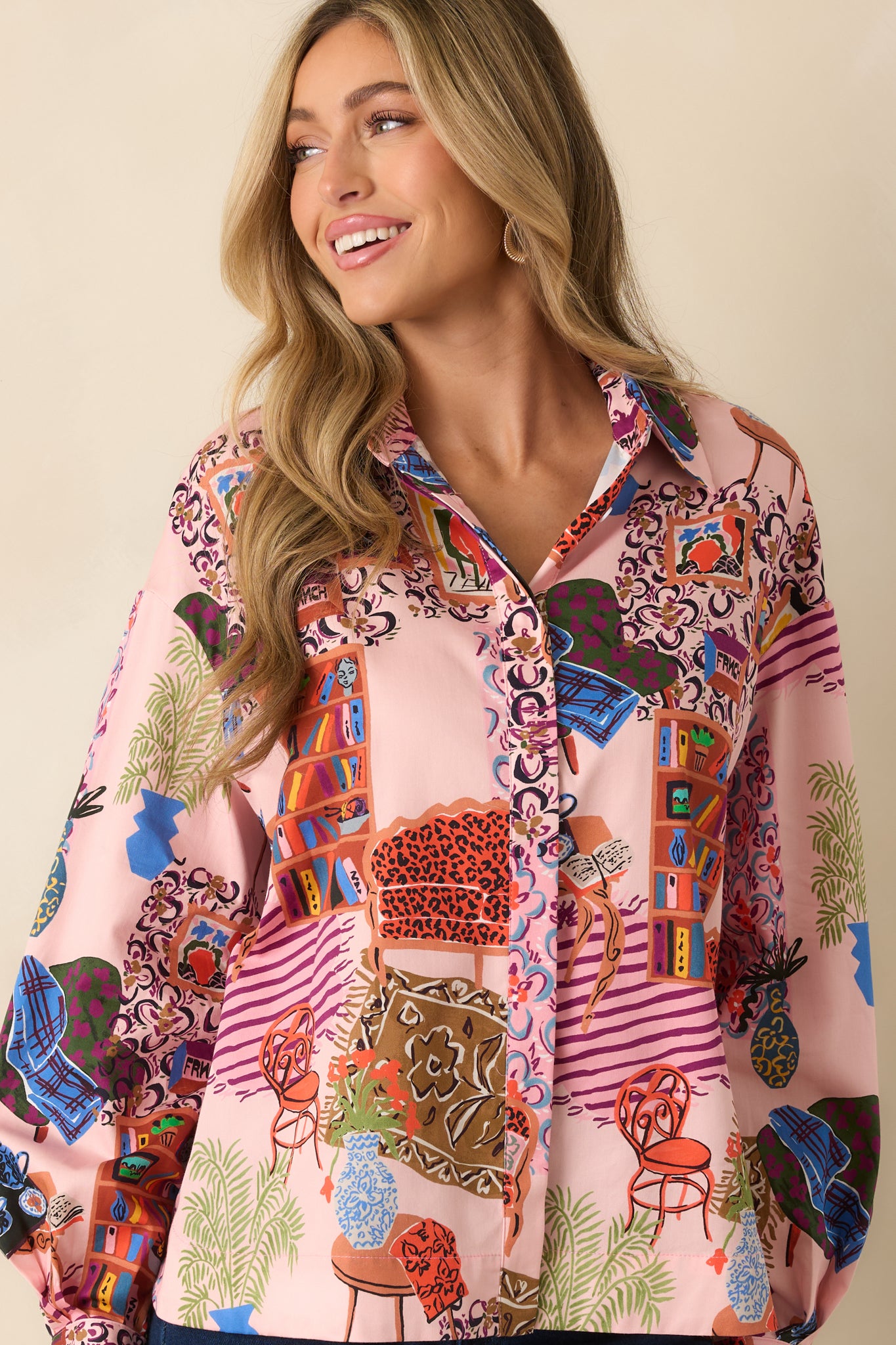 The front buttons are visible against the colorful woven print, emphasizing the relaxed silhouette.