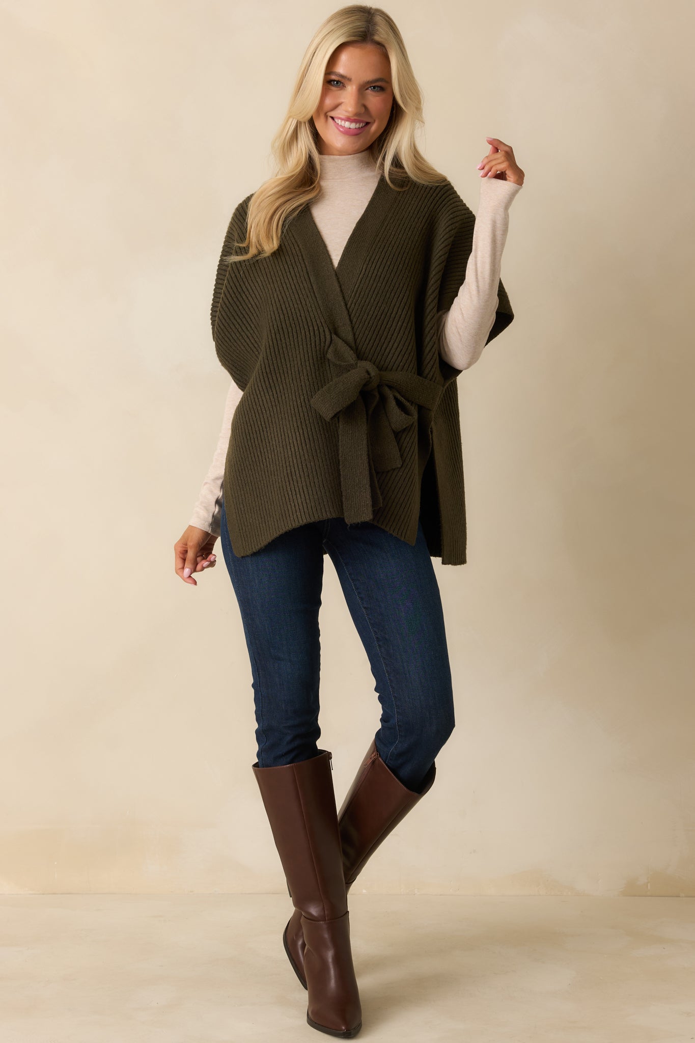 Olive green ribbed knit cardigan with short sleeves, open front, and self-tie waist belt in a relaxed silhouette.