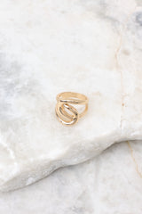 This ring features a gold double loop design.