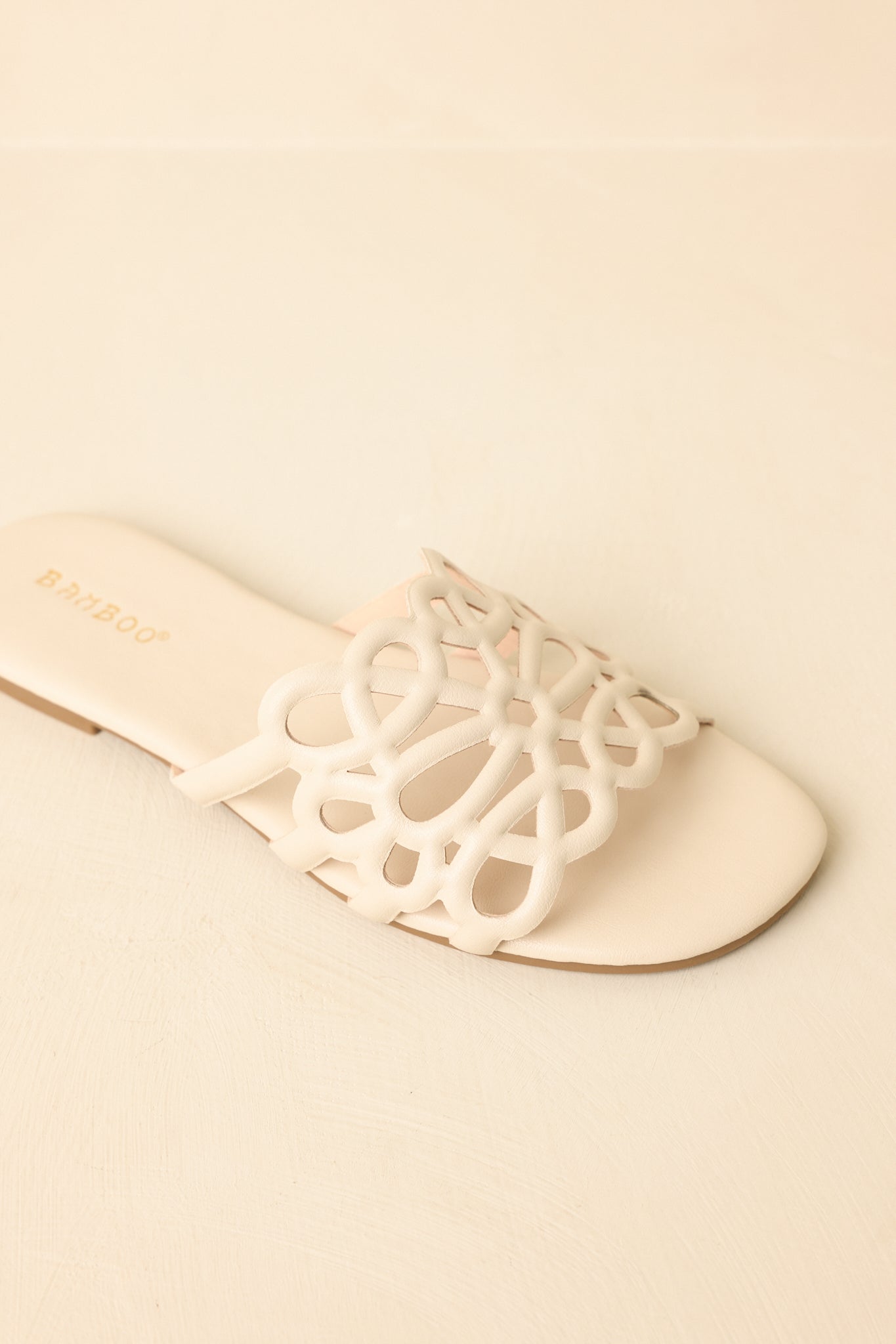 Top-down view emphasizing open-toe design and strap placement.