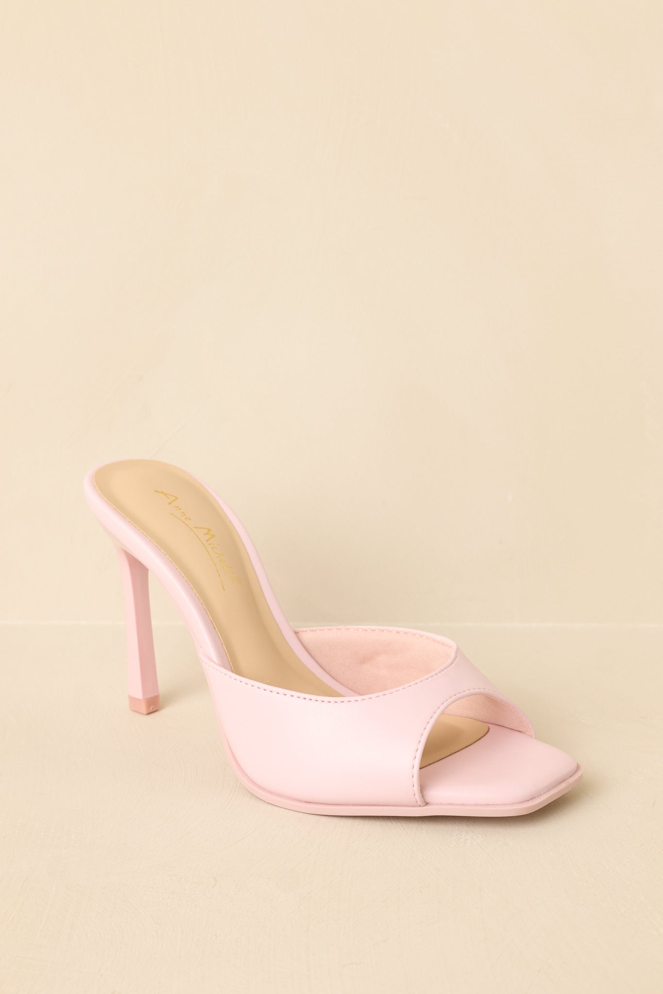 Three-quarter angle showcasing smooth finish and modern silhouette.
