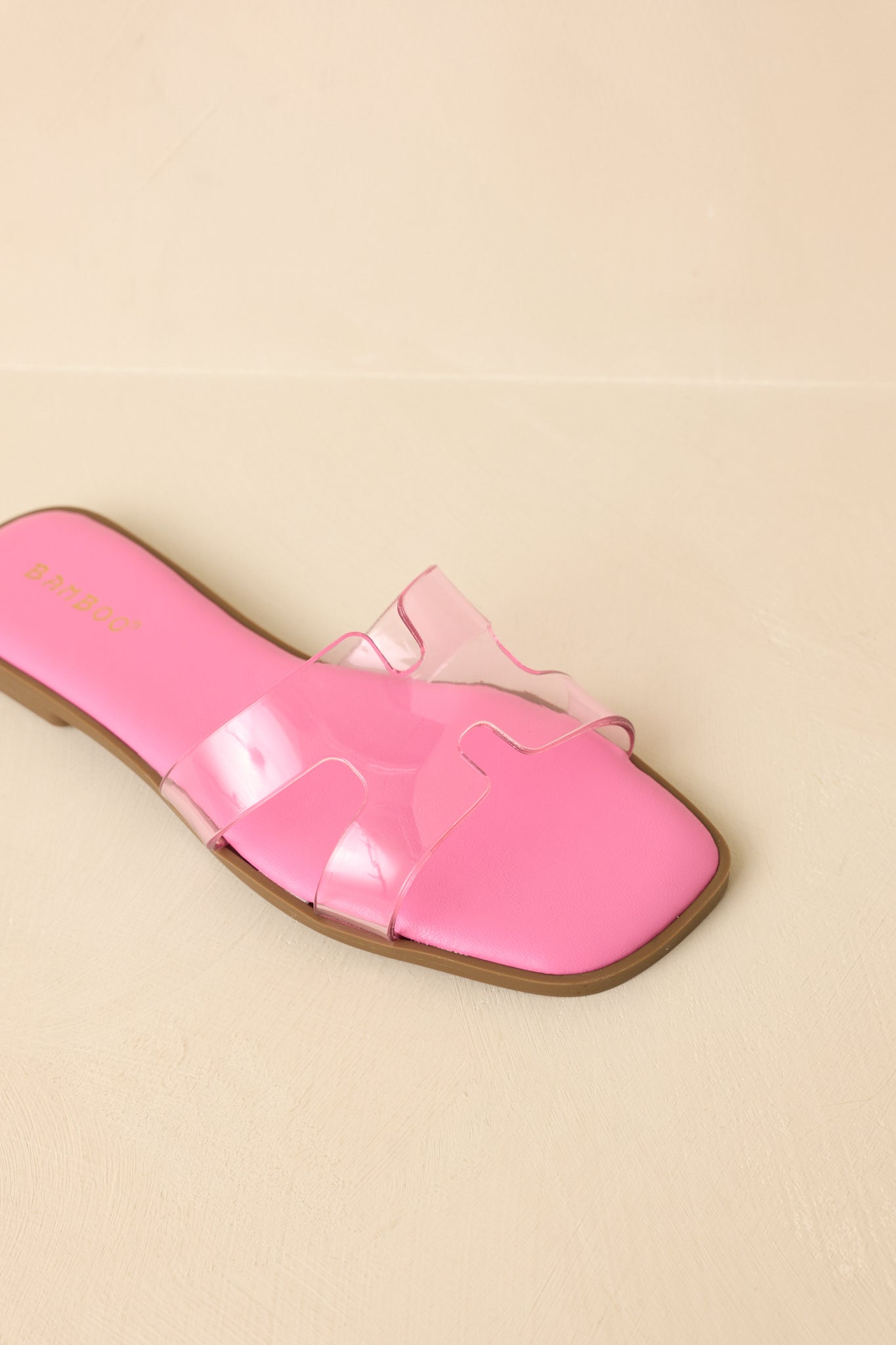 Top-down view emphasizing open toe shape and strap placement.