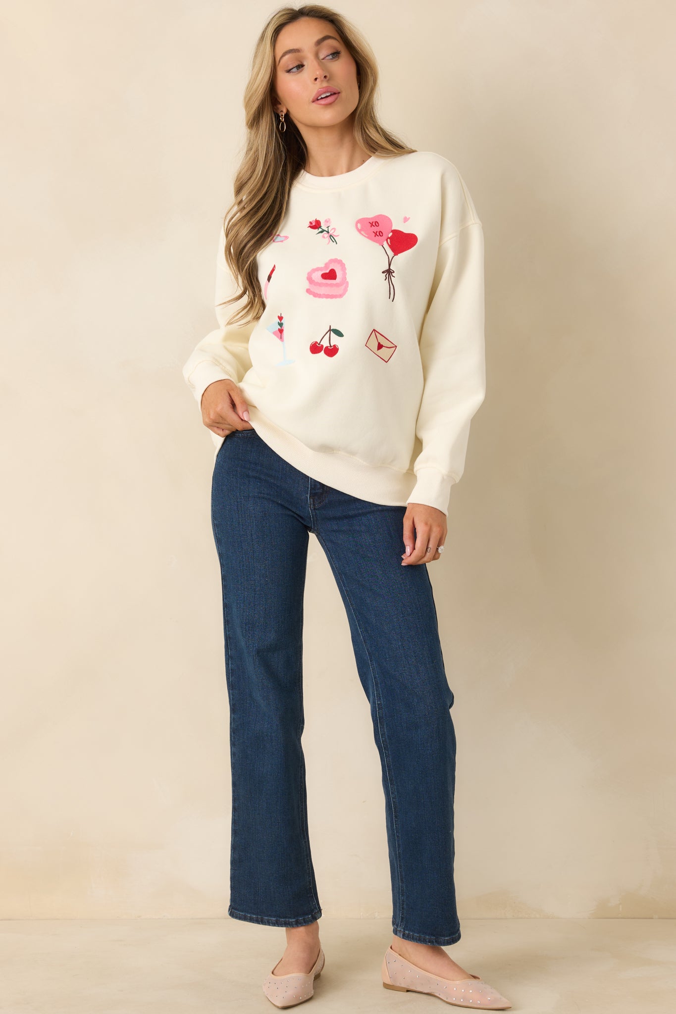 Full view of the sweatshirt showcasing the classic round neckline and midweight knit fabric.