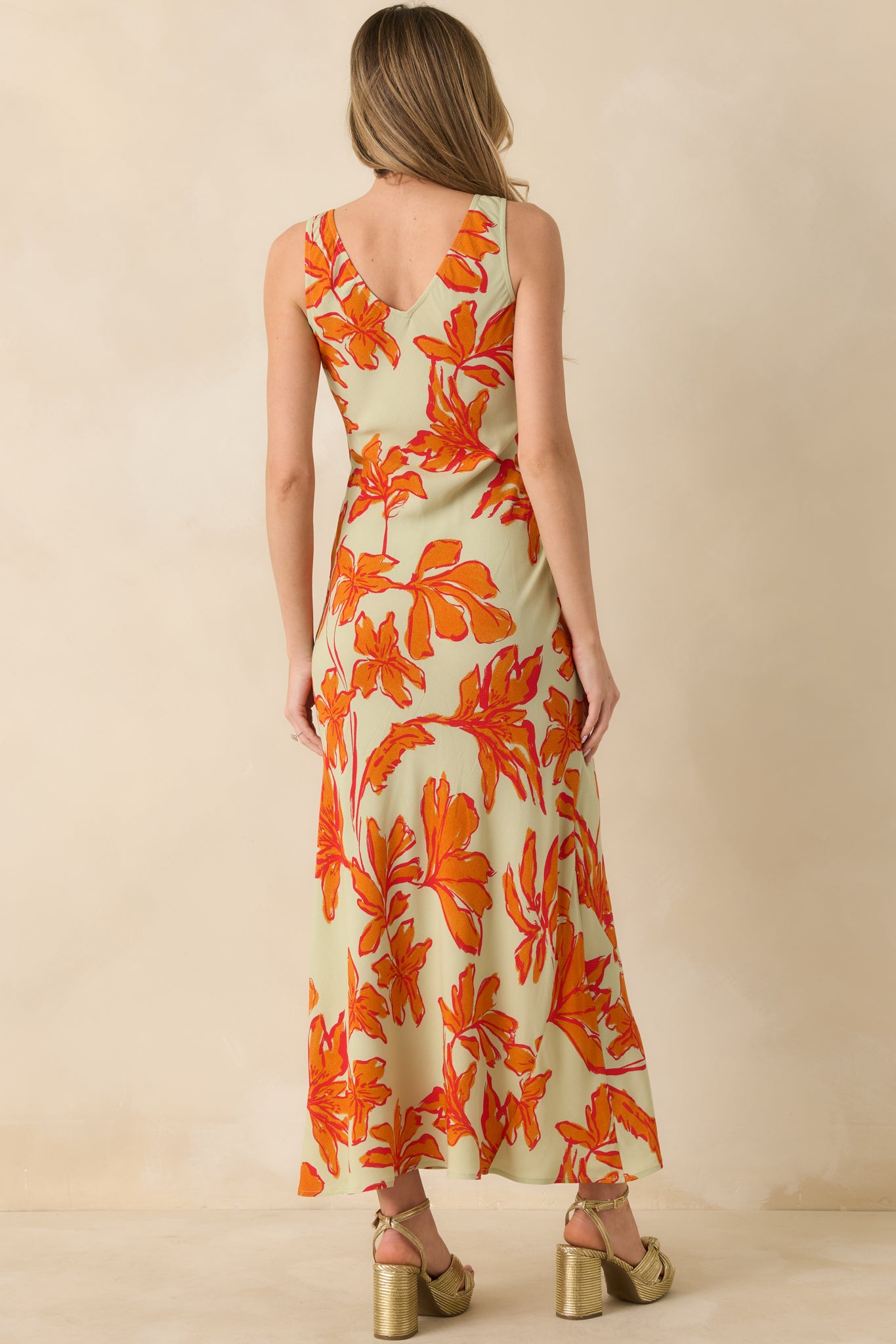 Rear view featuring the V-shaped design and discreet side zipper closure.