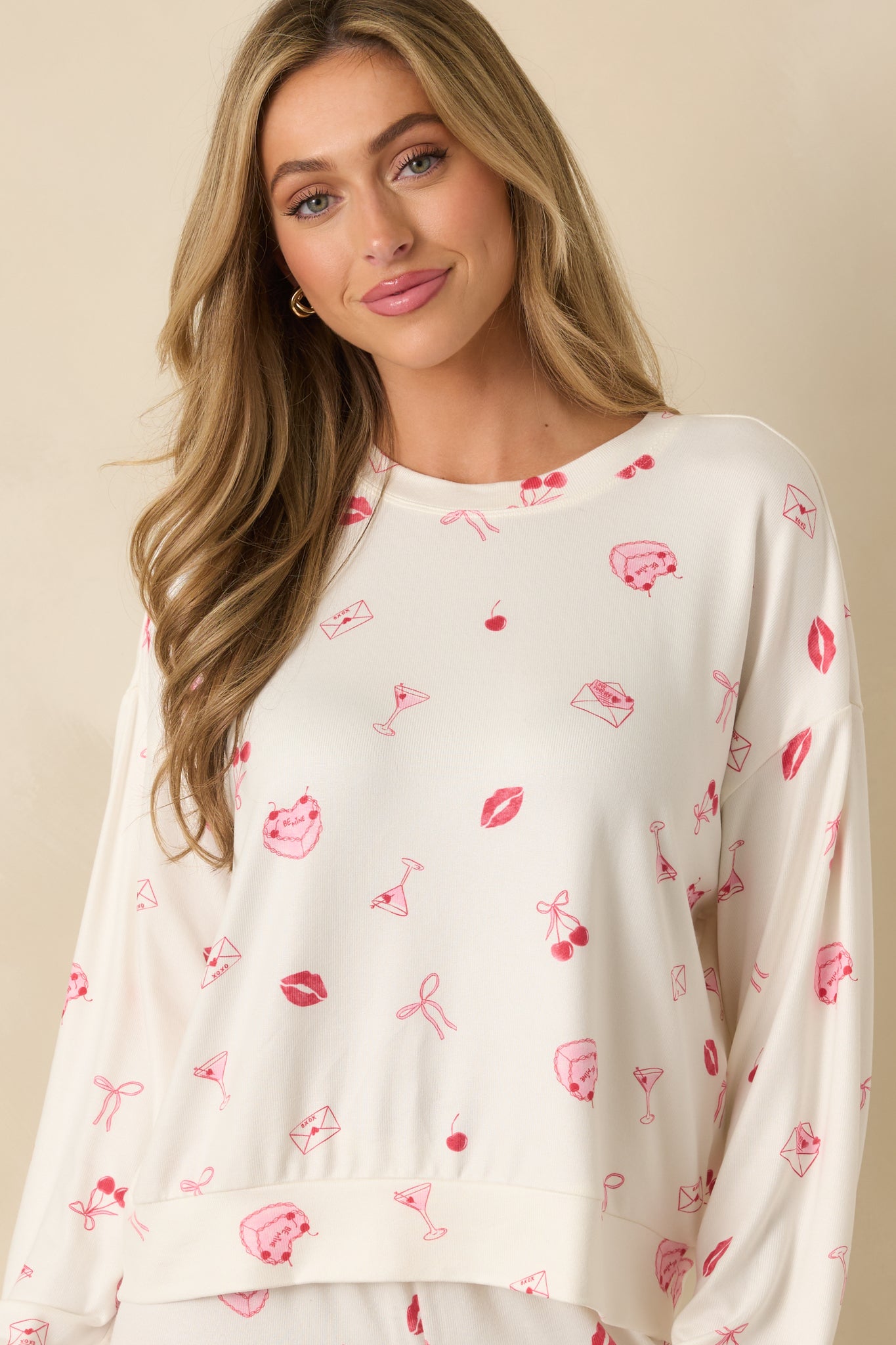 Front-focused detail emphasizing the ribbed crew neckline and dropped shoulder.