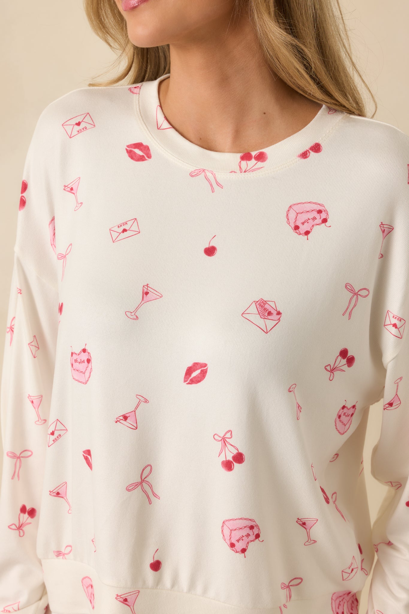 Close-up of the soft knit fabric and pink novelty print pattern.