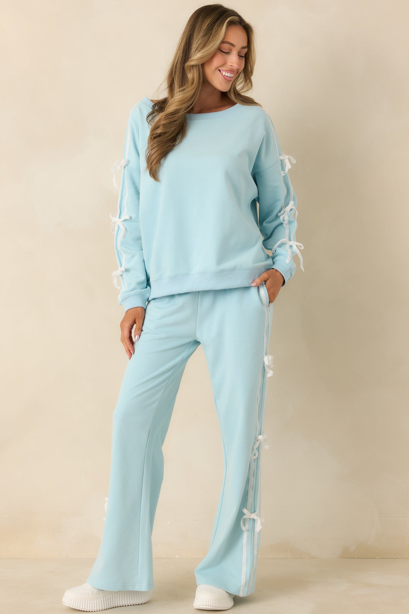 Comfortable pull-on aqua sweatpants with relaxed fit and subtle decorative side accents.