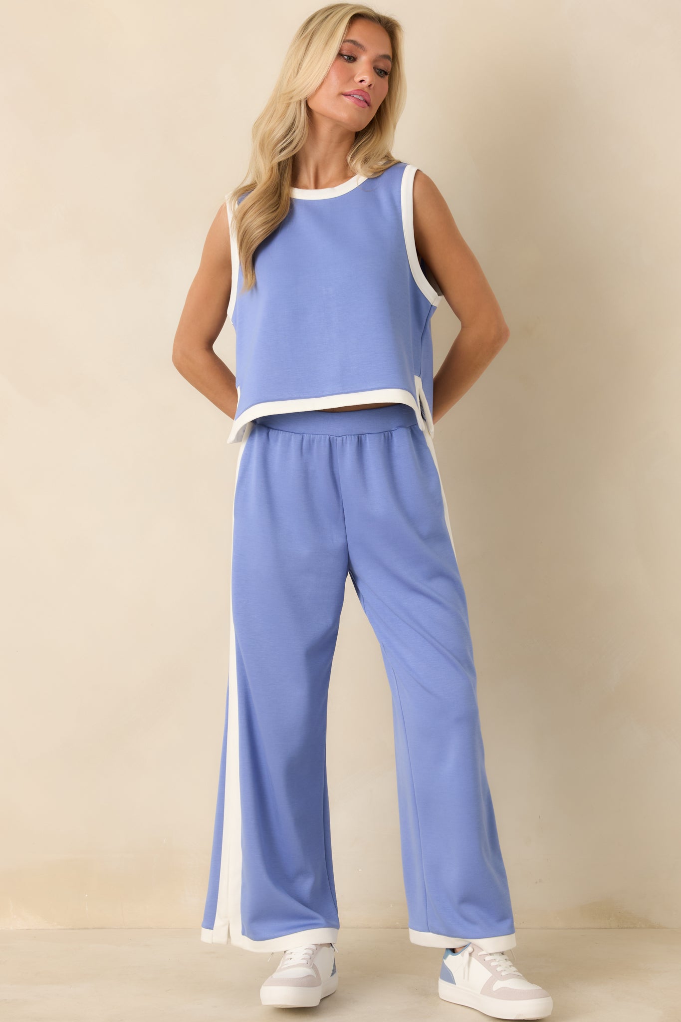 Soft knit wide-leg pants in periwinkle featuring an elastic waistband for effortless comfort.