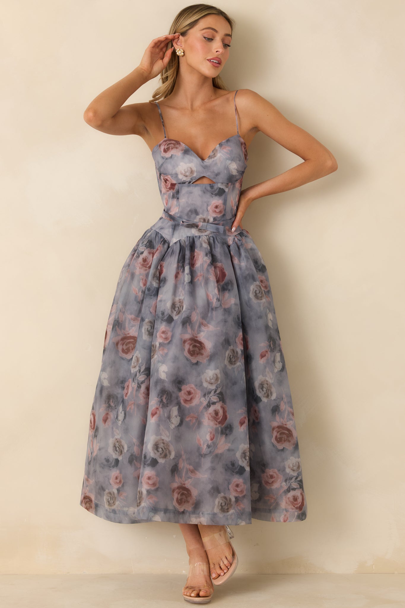 Grey strapless midi dress with a sweetheart neckline, structured bodice, and flowy floral skirt.
