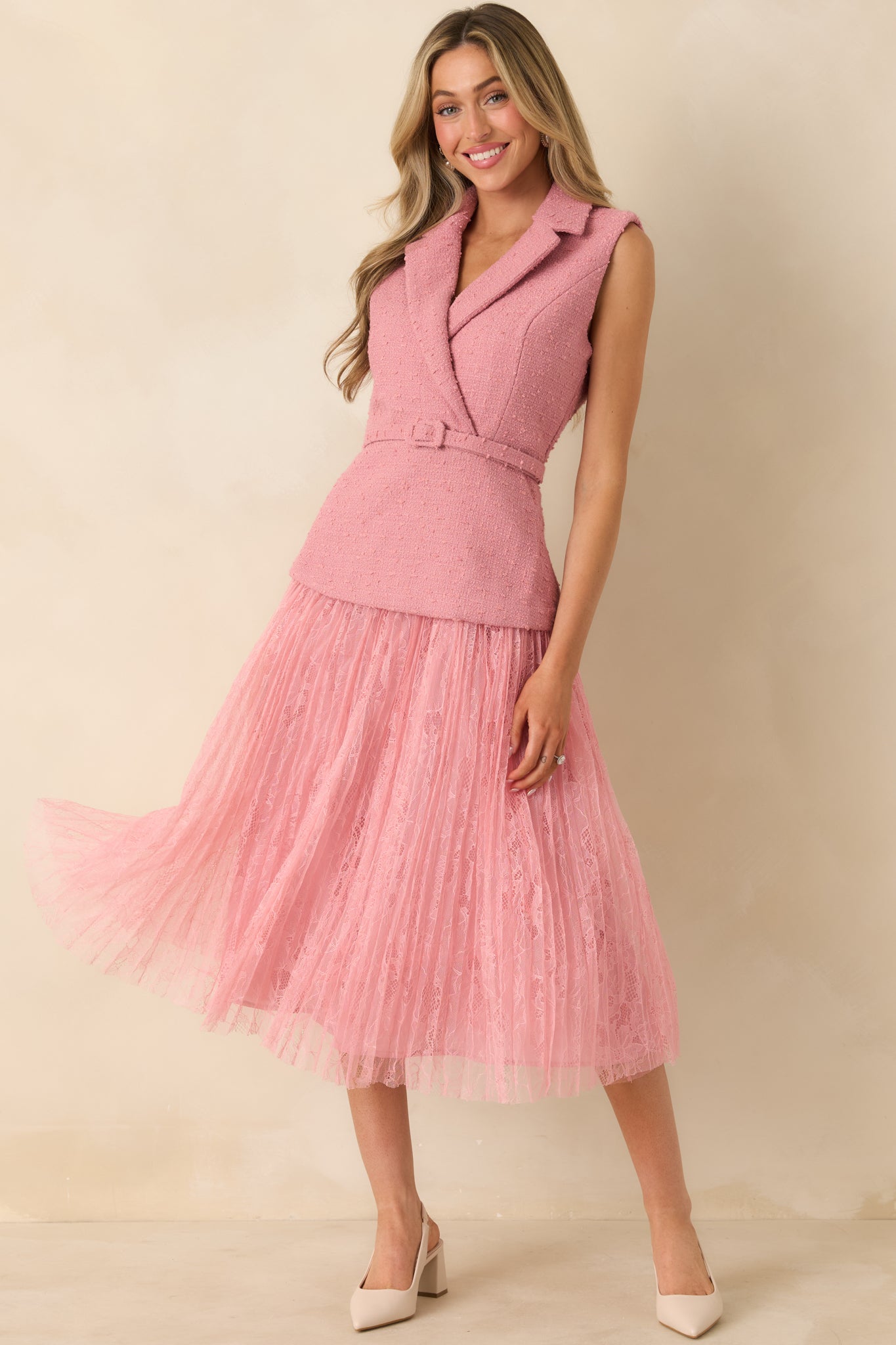 Rose pink sleeveless midi dress with a tweed-inspired woven bodice and a notched collar neckline.