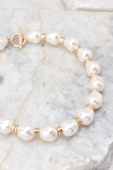 3 The New Classic Gold Pearl Necklace at reddress.com