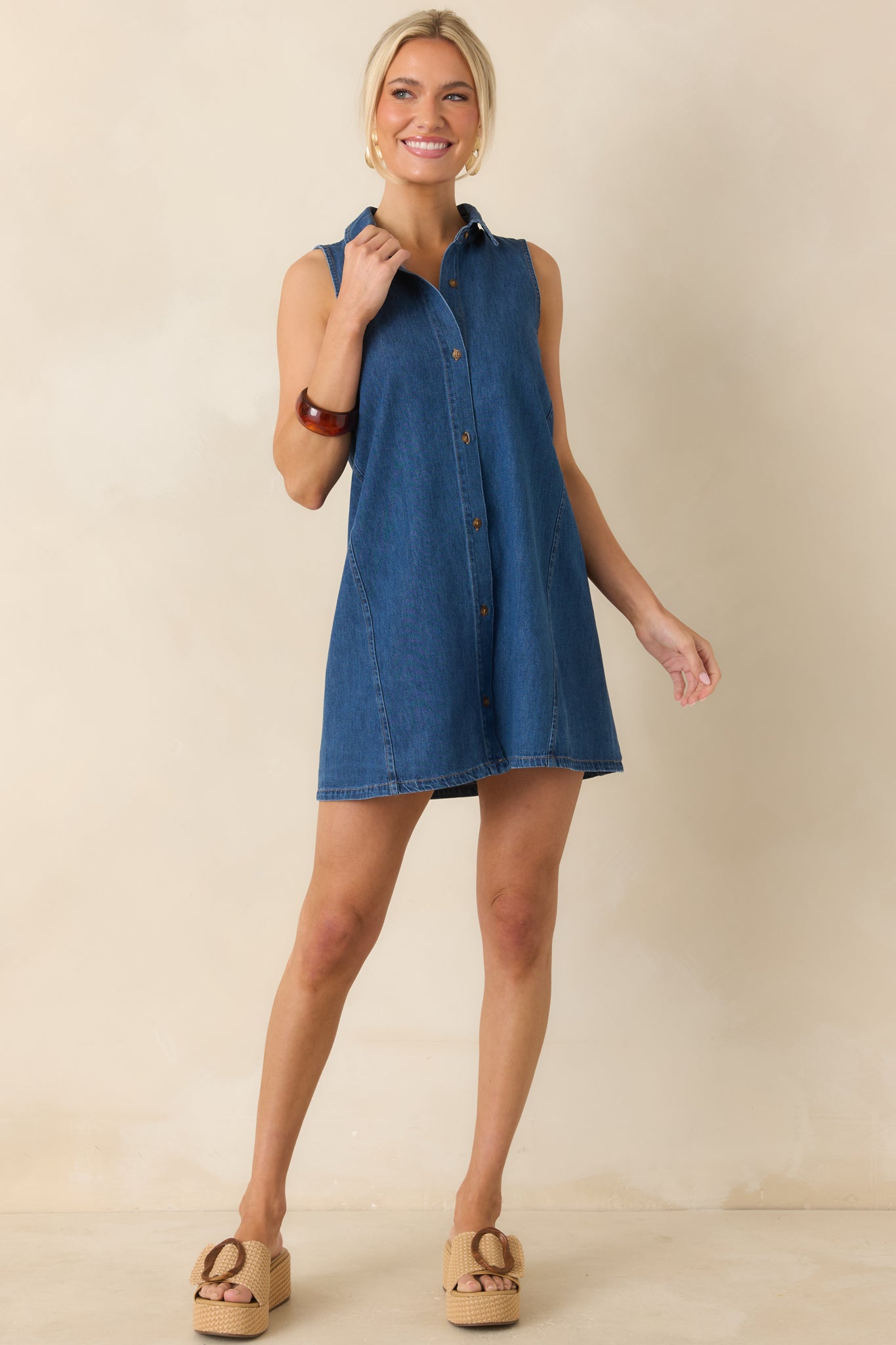 Full-length look showcasing the lightweight denim fabric and straight mini dress shape with effortless drape.