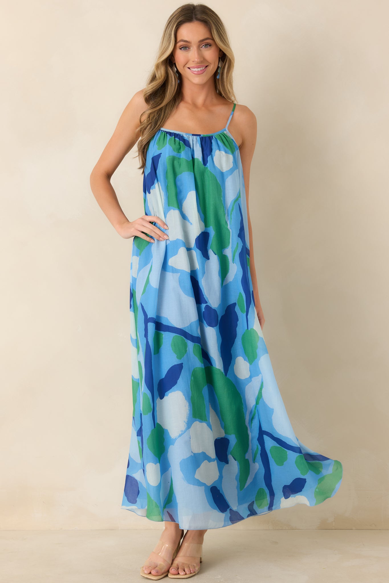Lightweight cotton-silk maxi dress featuring relaxed fit and gathered neckline.