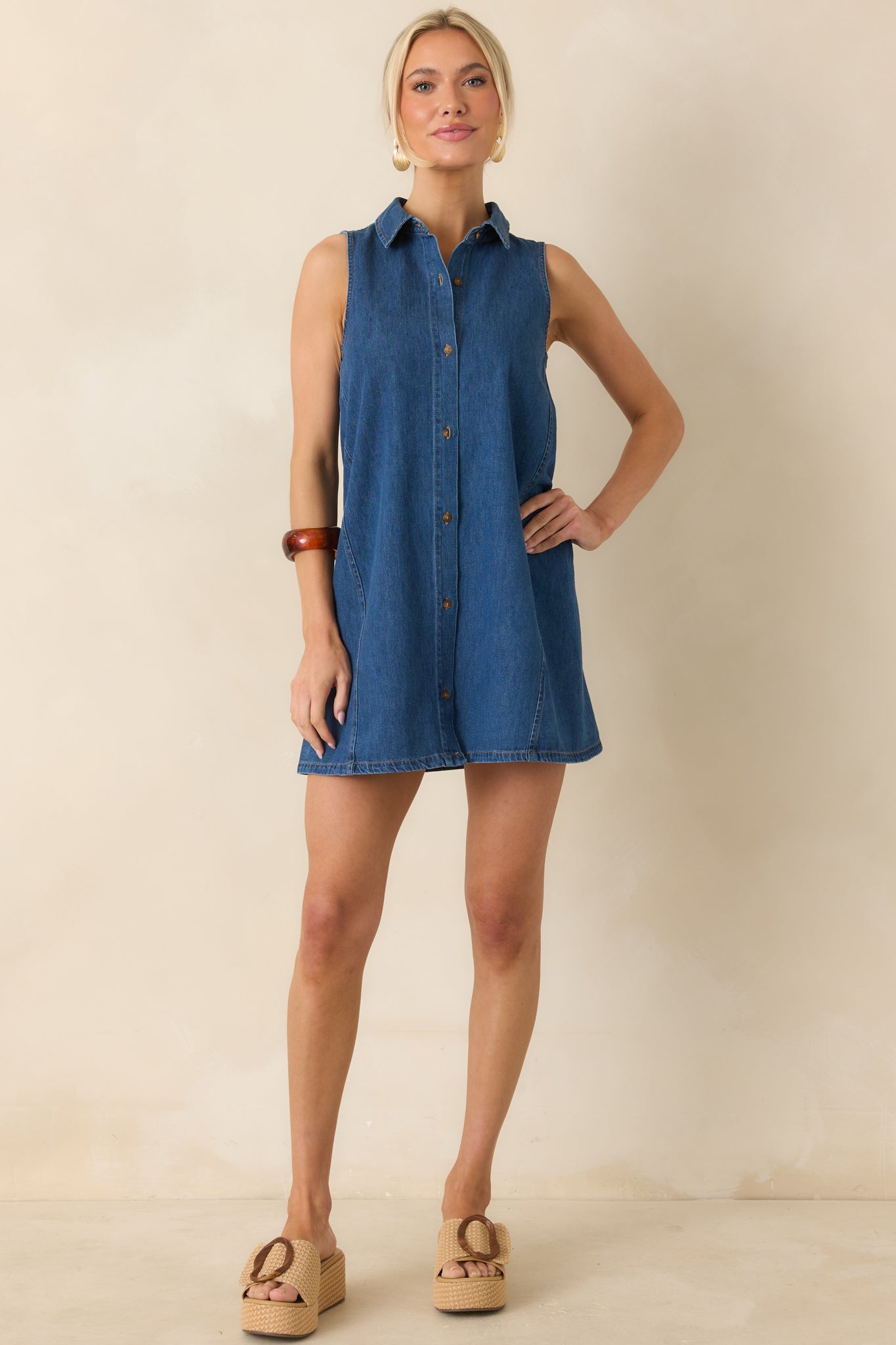 Front-facing view emphasizing the casual, throw-on-and-go design with clean button detailing and side pocket structure.