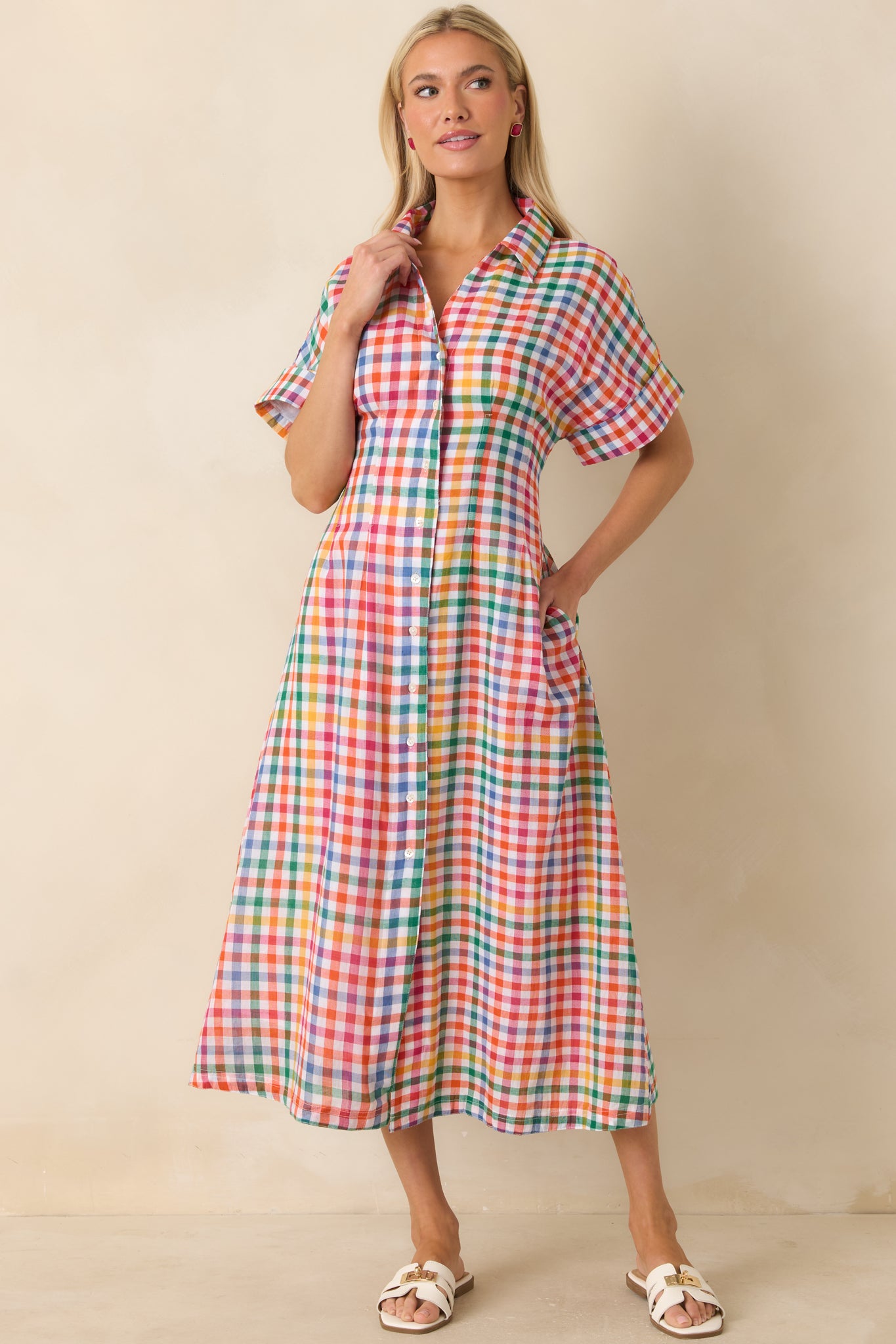 Multi plaid midi dress with soft cotton fabric, structured collar, and easy short sleeve button-front silhouette.