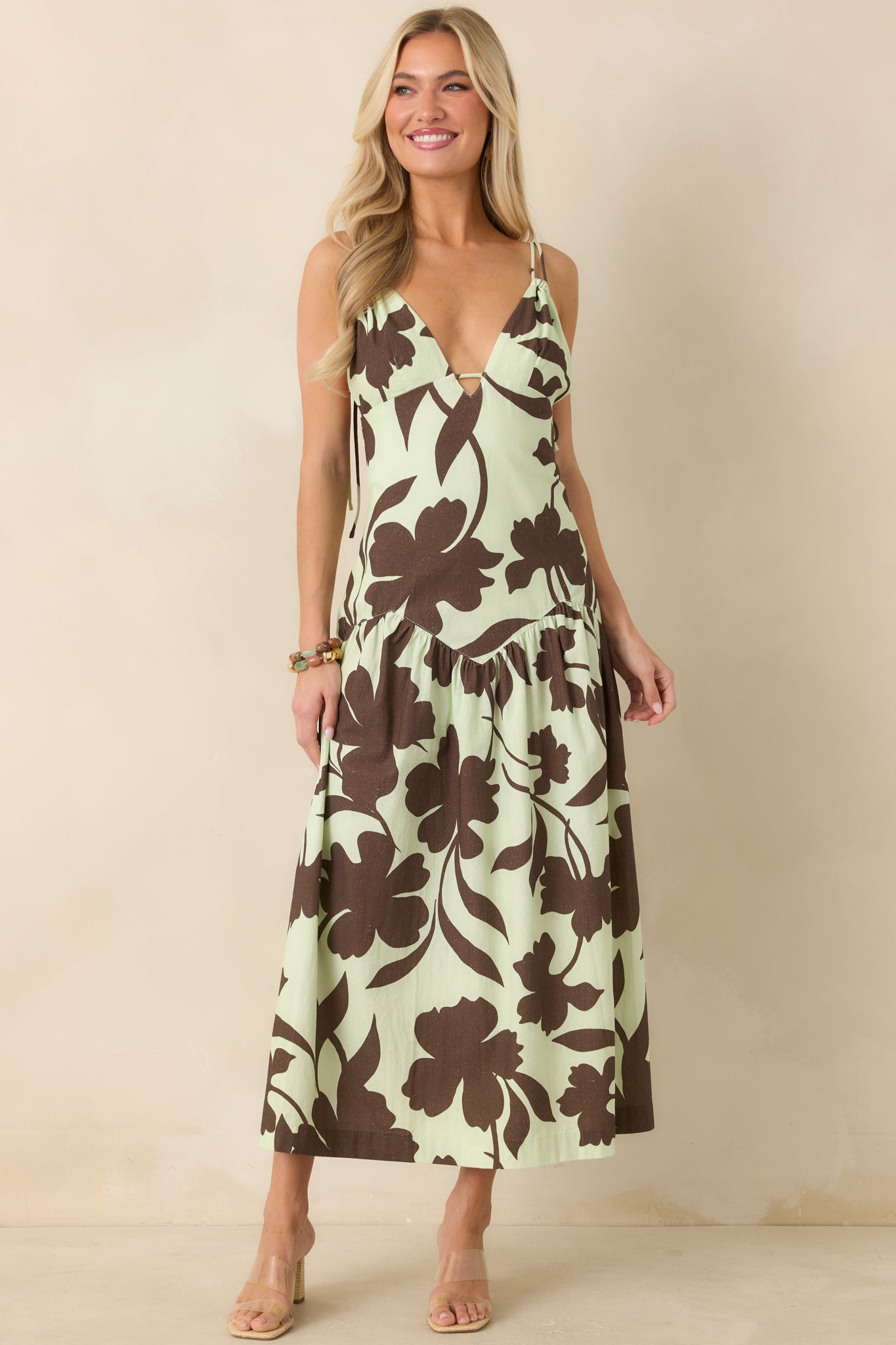 Mint and chocolate floral dress with flattering V-neck and relaxed, feminine drape.