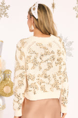 Back view of this sweater that features a ribbed crew neckline, hemline slits, and eccentric sequin designing.