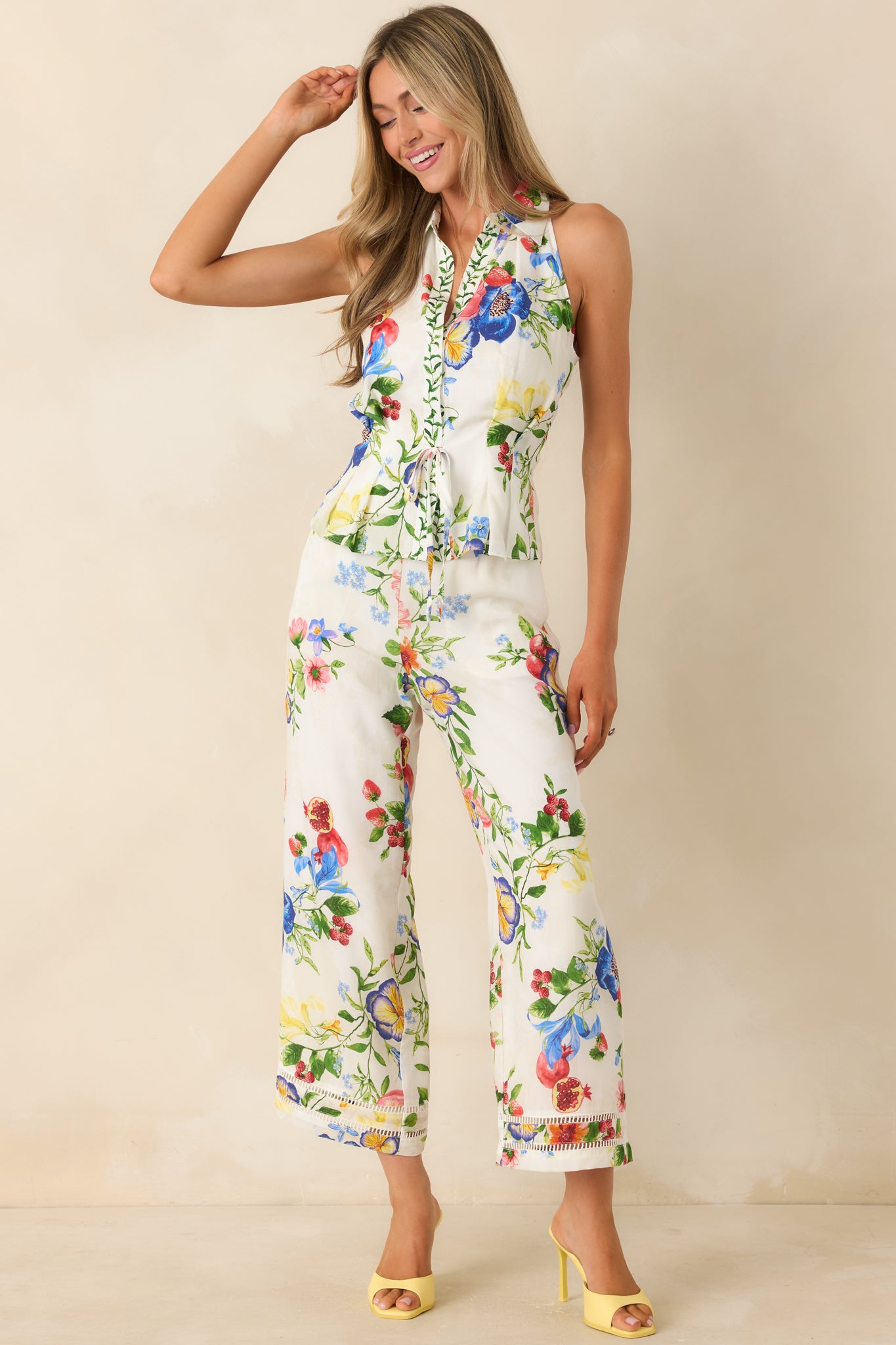 Botanical print cropped wide leg pants with relaxed silhouette and fluid drape.