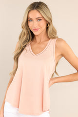 Front view of this top that features a v-neckline, transparent detailing, and a soft & lightweight material.