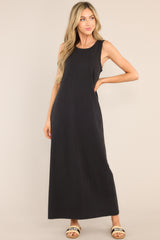 Front view of this dress that features a crew neckline, a straight silhouette, and a slightly stretchy cotton material that gives it a relaxed fit. Belt is not included.