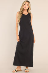 Full body view of this dress that features a crew neckline, a straight silhouette, and a slightly stretchy cotton material that gives it a relaxed fit. Belt is not included.