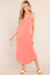 Cotton tango midi dress with a sleeveless design, scoop neckline and hem, and a vibrant hue. 