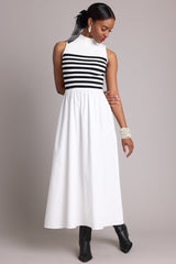 Relaxed full body view of Black and White Sleeveless Striped Maxi Dress.