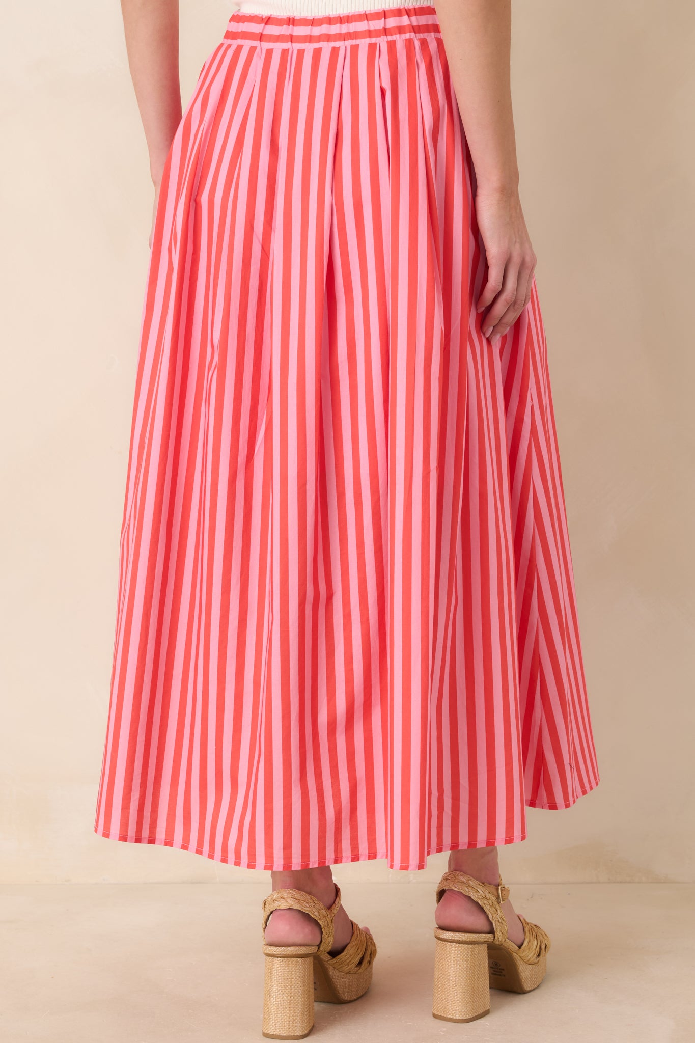 Rear view of the cotton maxi skirt featuring the elastic waistband panel for a secure and flexible fit.