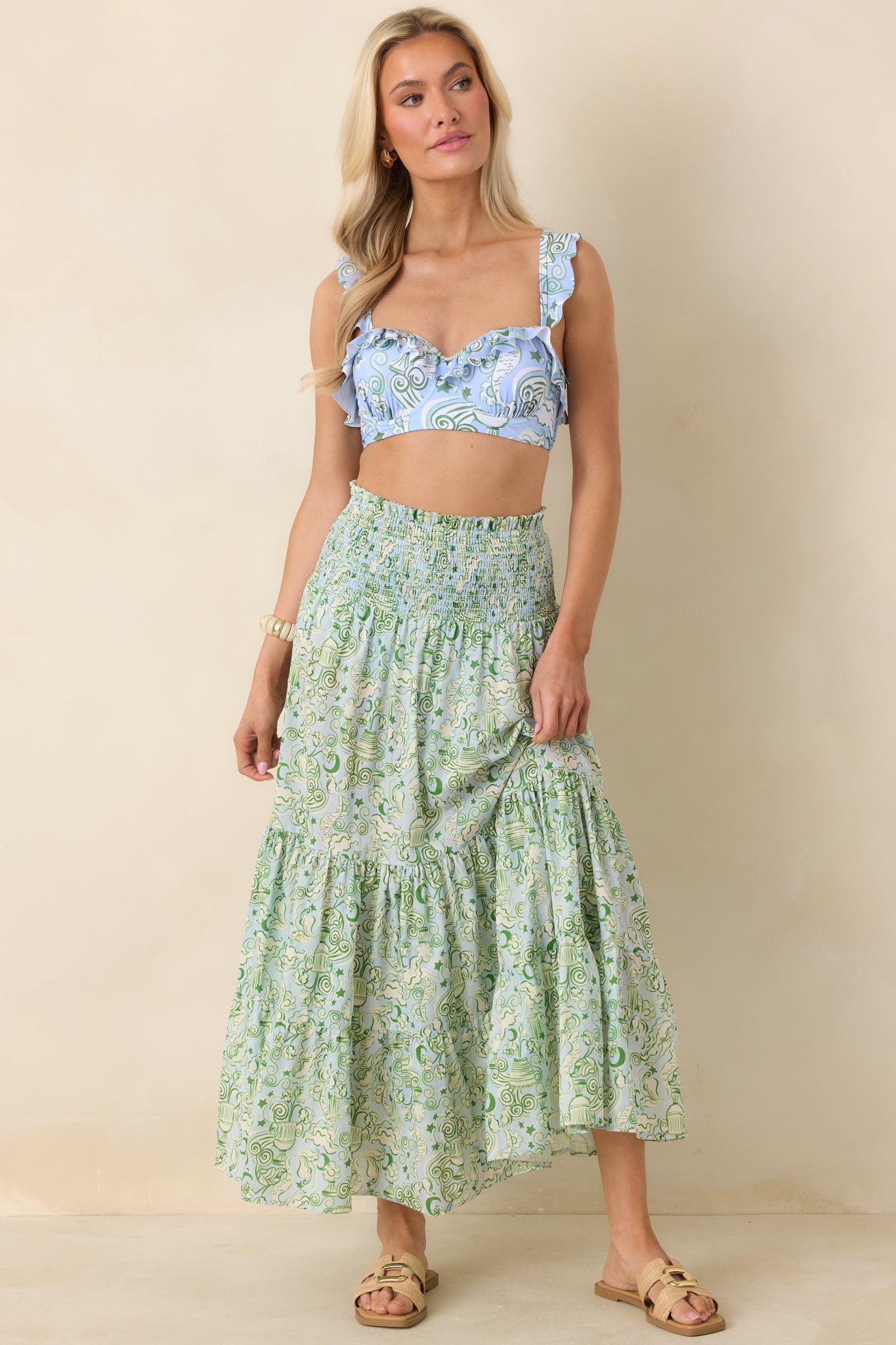 Full-length maxi skirt in blue and green with stretch smocked top and lightweight fabric for ease of wear.