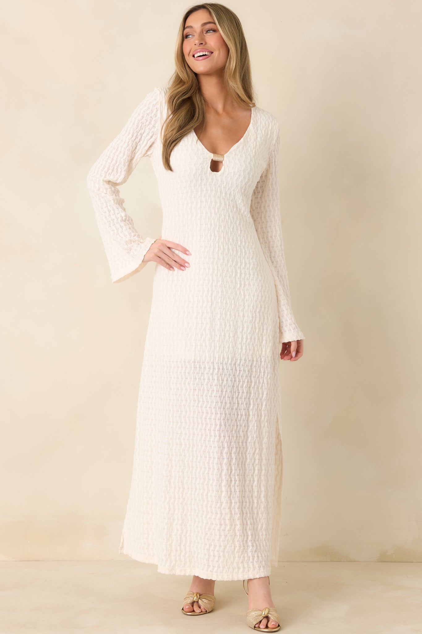 Textured maxi dress with mini-length lining and graceful, flowy skirt.