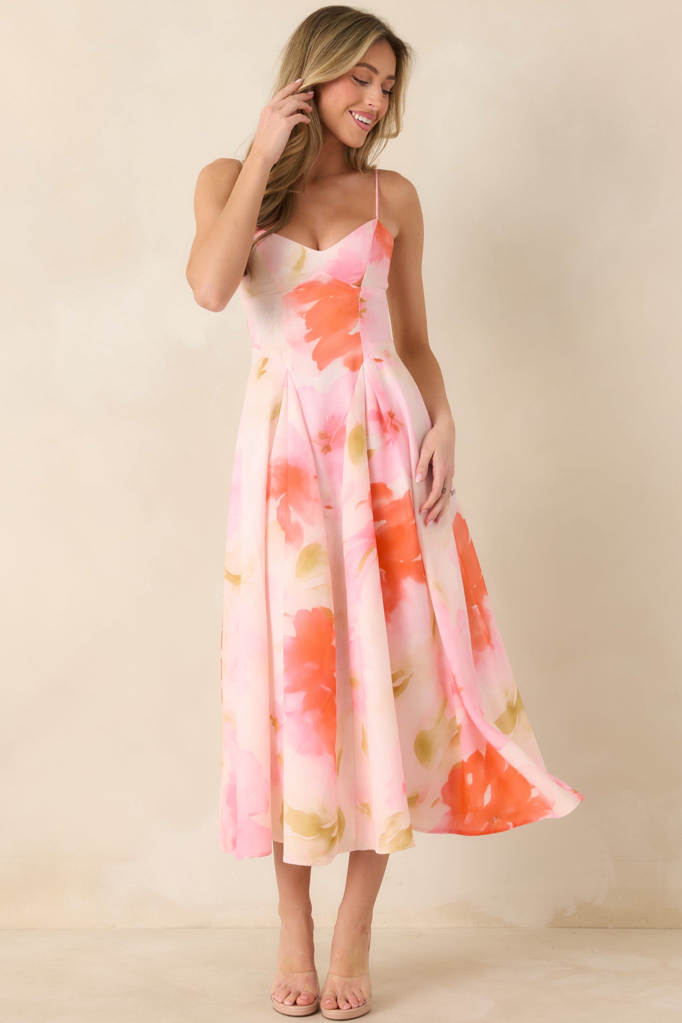 Flattering A-line midi dress featuring flowy skirt and polished woven fabric for elegant movement.