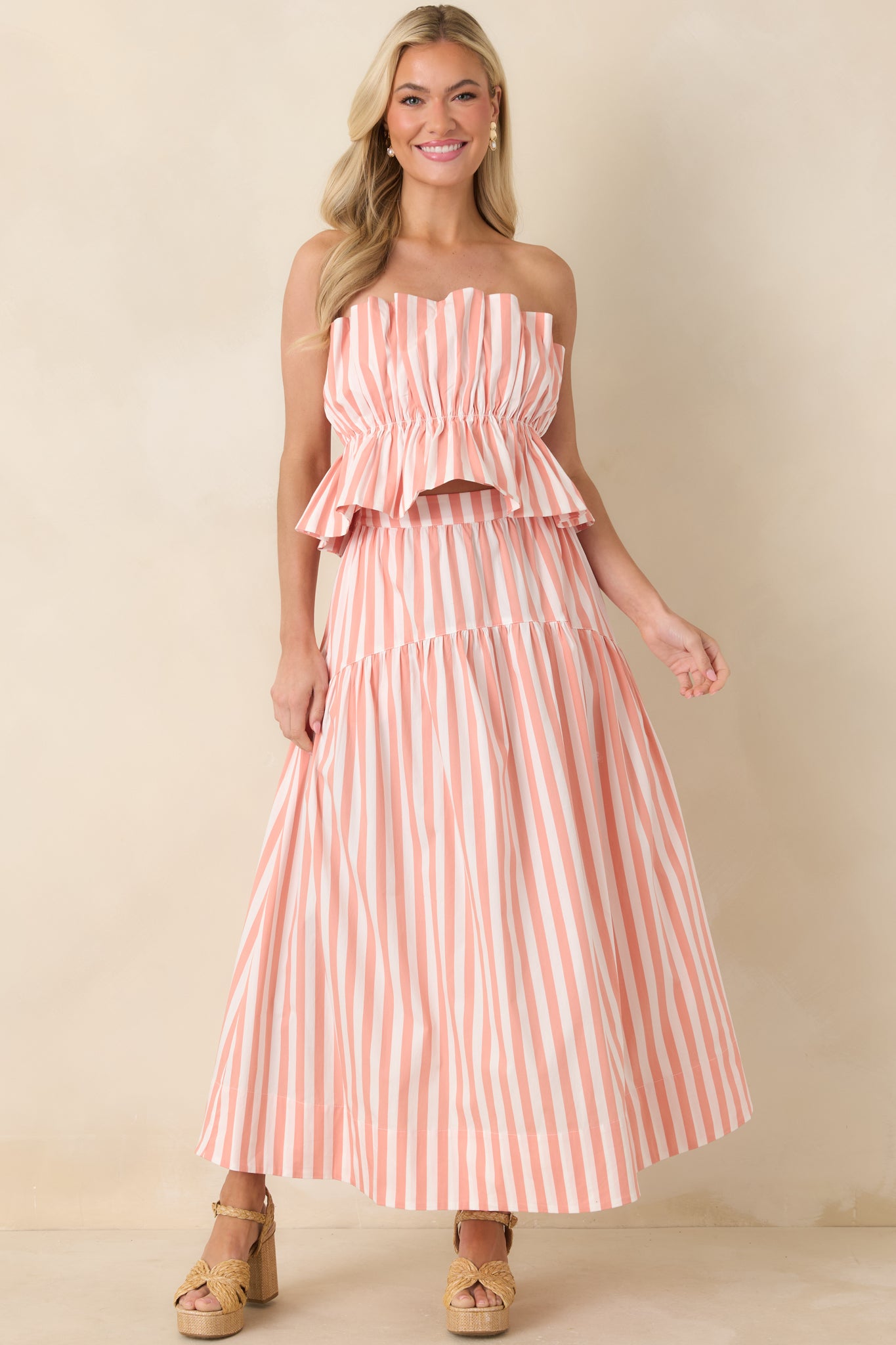 Strapless bandeau top with an elasticized bodice for a secure pull-on fit and a smooth, streamlined silhouette.