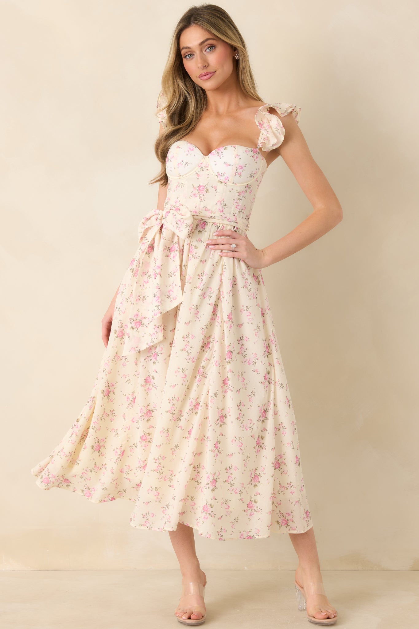 Rose pink floral maxi dress with padded underwire bust, corset detailing, and ruffle shoulder straps, shown front on.