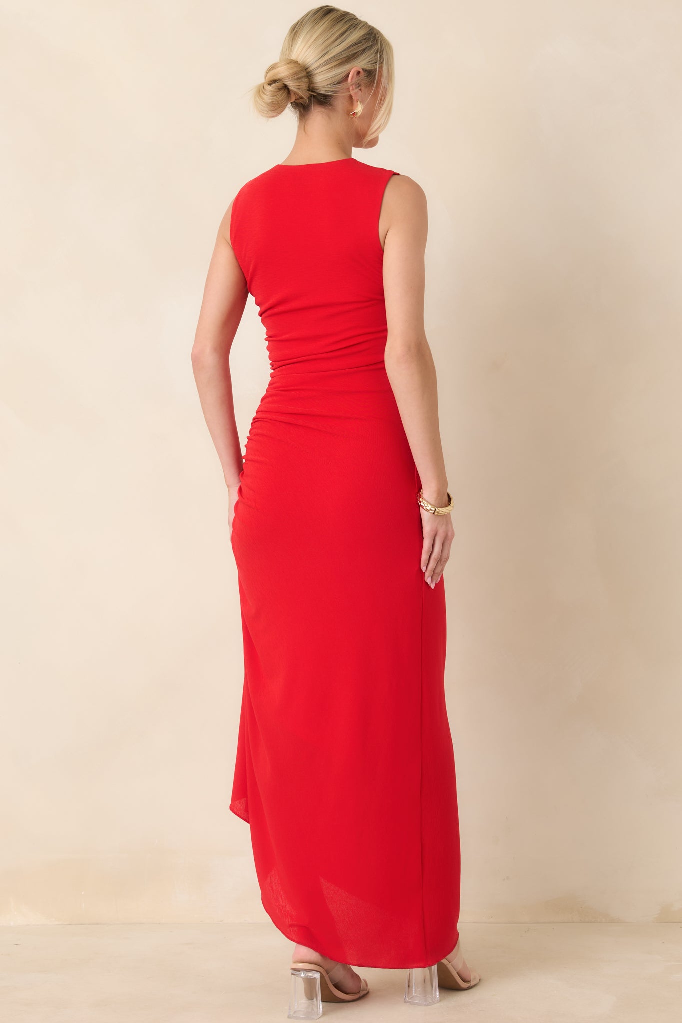 Red midi dress displaying a smooth, streamlined rear silhouette with sleeveless shaping and clean pull-on design.