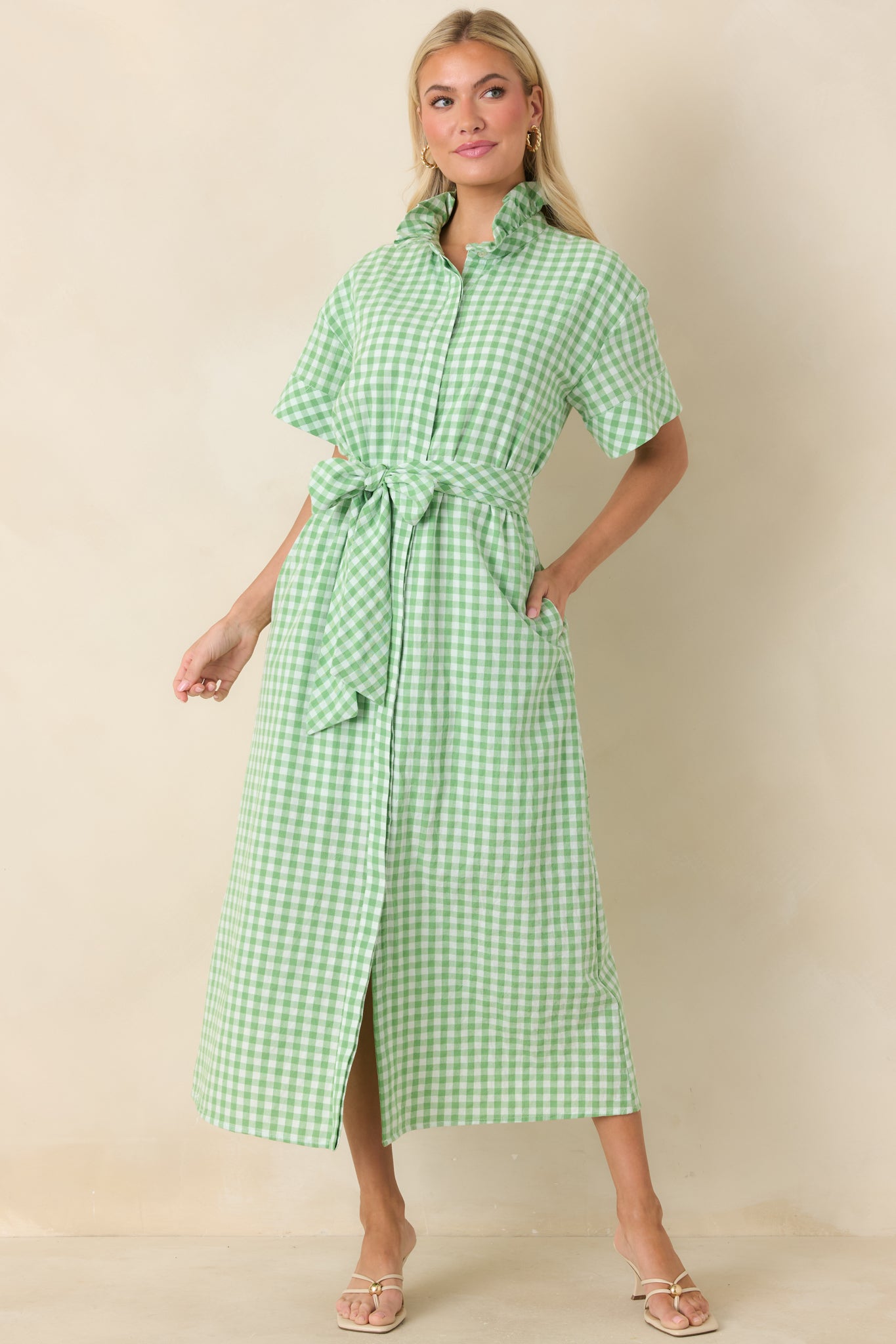 Mini dress featuring lightweight woven fabric, coordinating hem trim, and relaxed pullover fit.