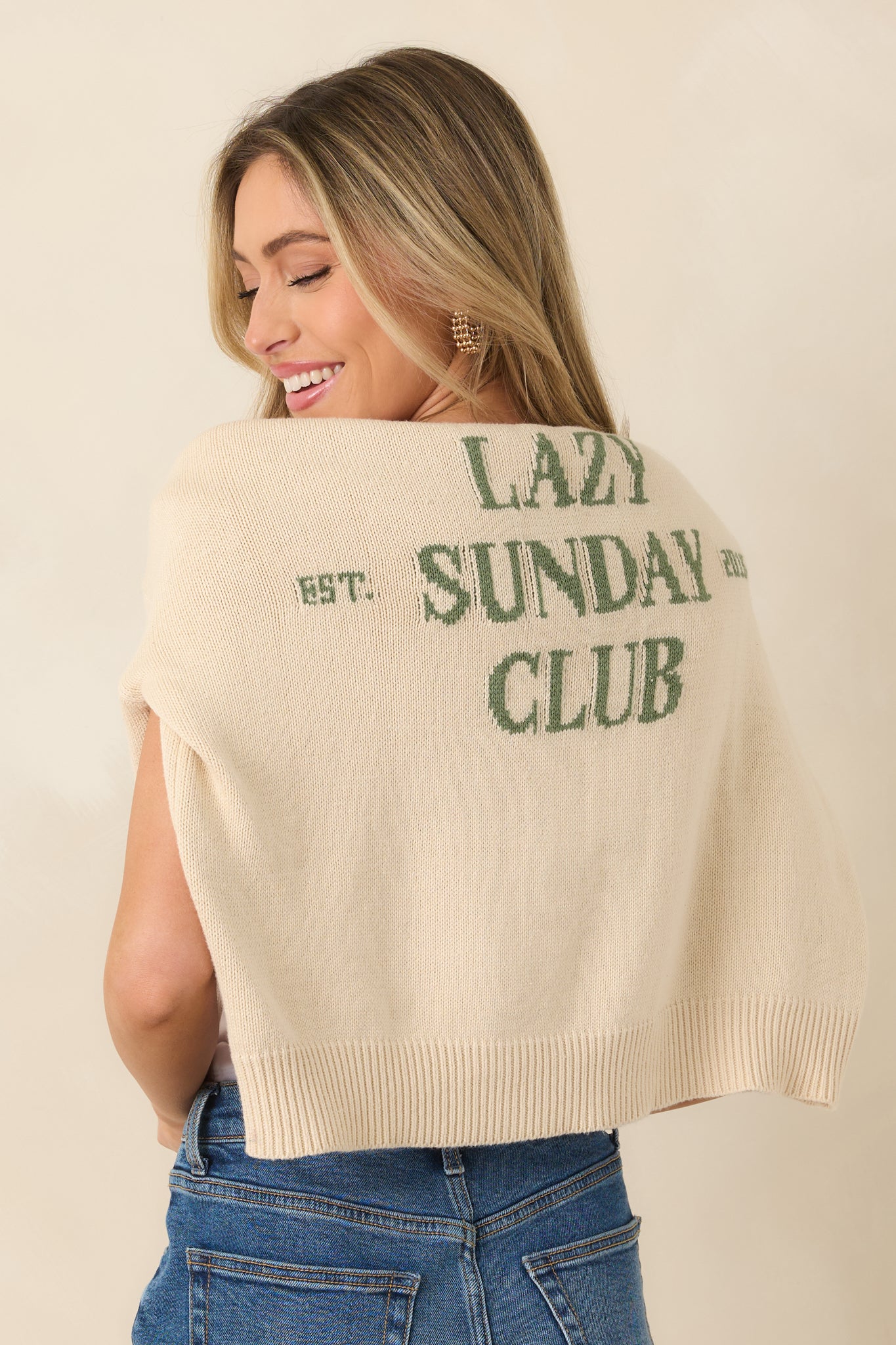 Close view of the knit texture and chest graphic highlighting the relaxed fit.