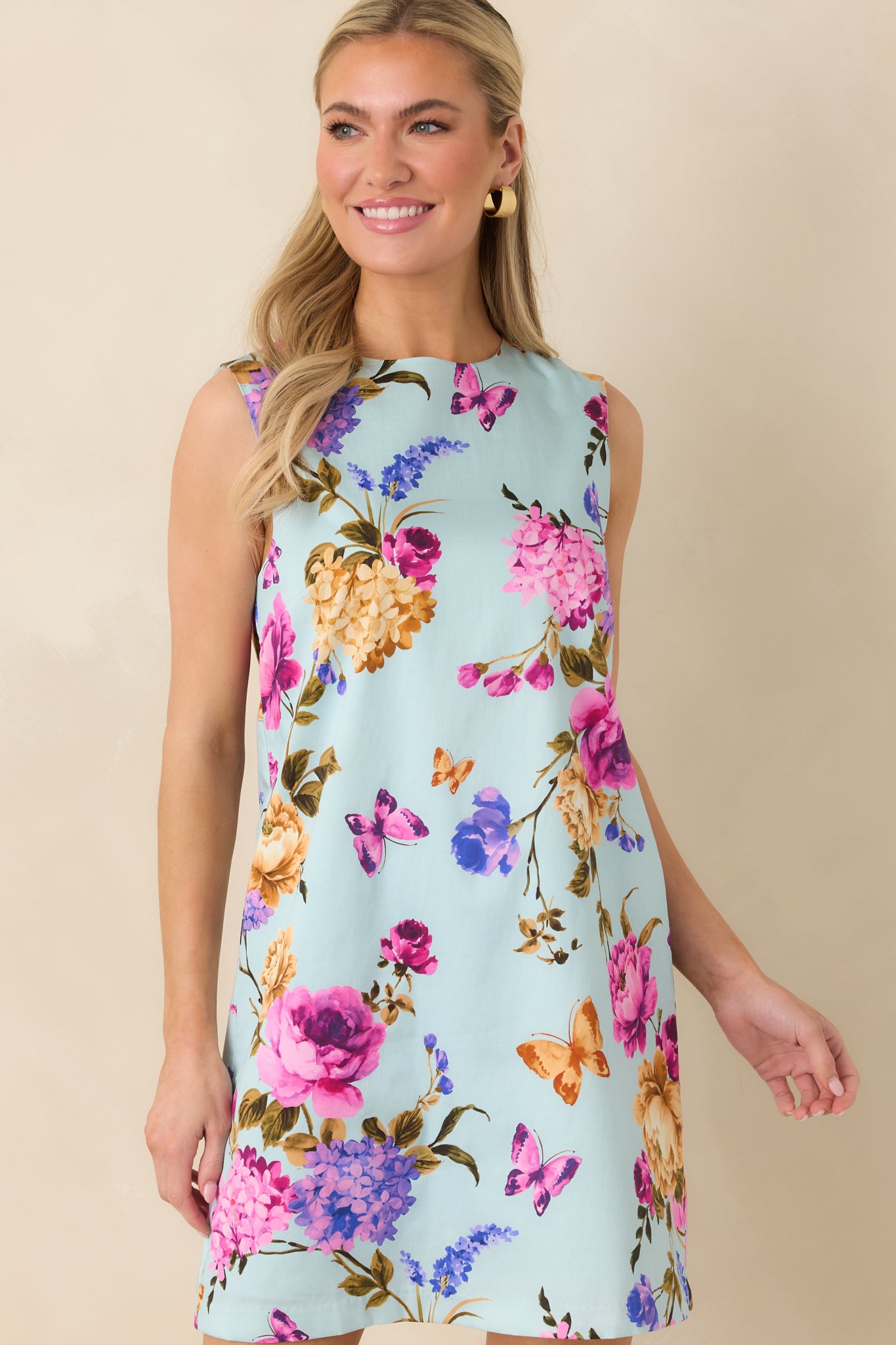 Midsection crop highlighting the straight silhouette and subtle drape of the fabric.