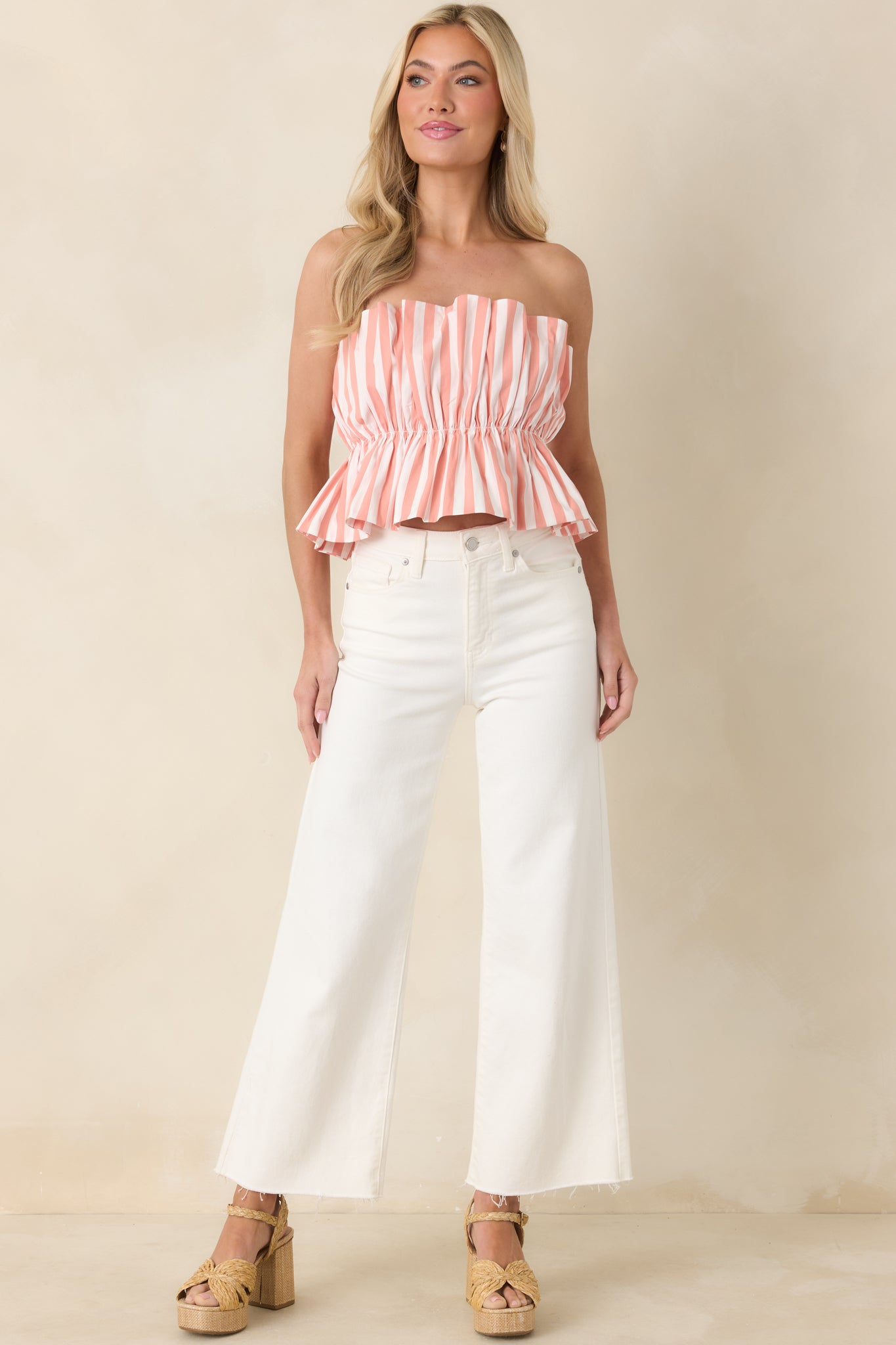 Pull-on strapless top designed with a supportive elastic bodice and sleek, minimal shape.