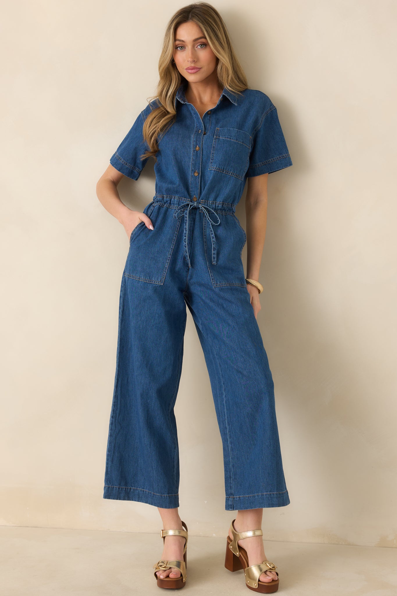 Front view highlighting laid-back yet polished design with cropped wide legs and soft denim fabric.