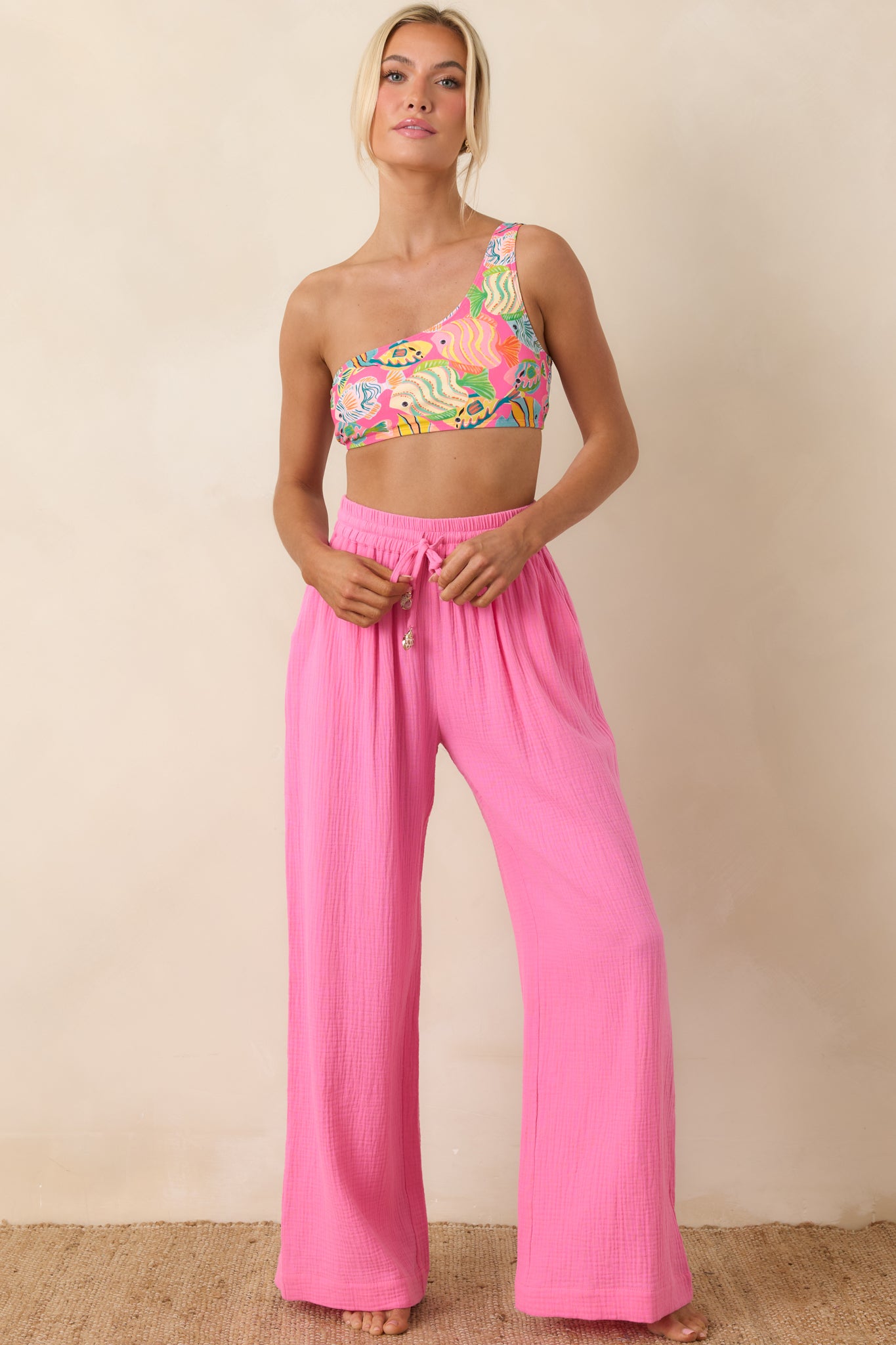 Breezy cotton pants featuring textured fabric and flowing wide-leg design.
