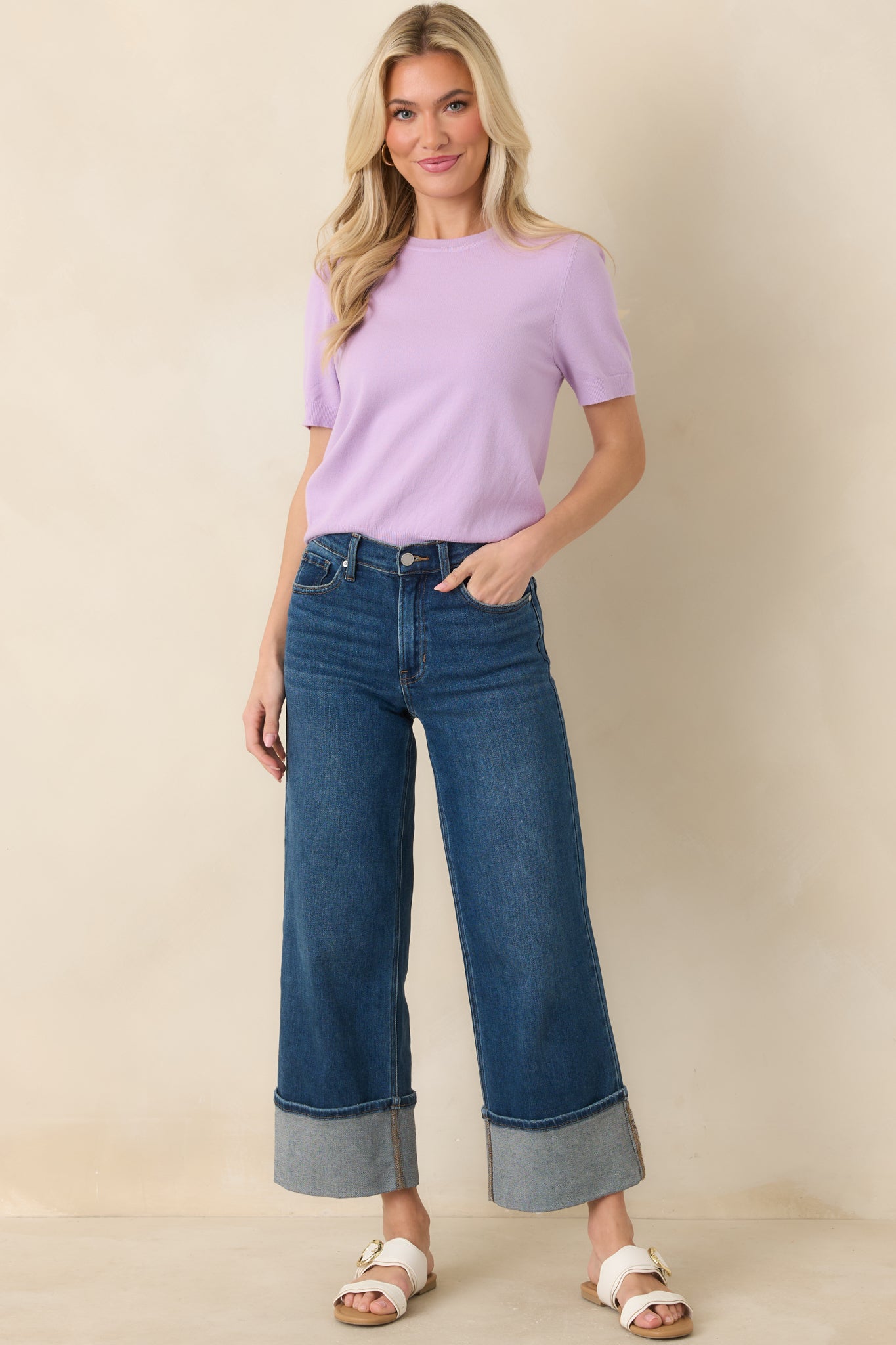 Front view of a lavender short sleeve knit top with a classic crew neckline and smooth silhouette.