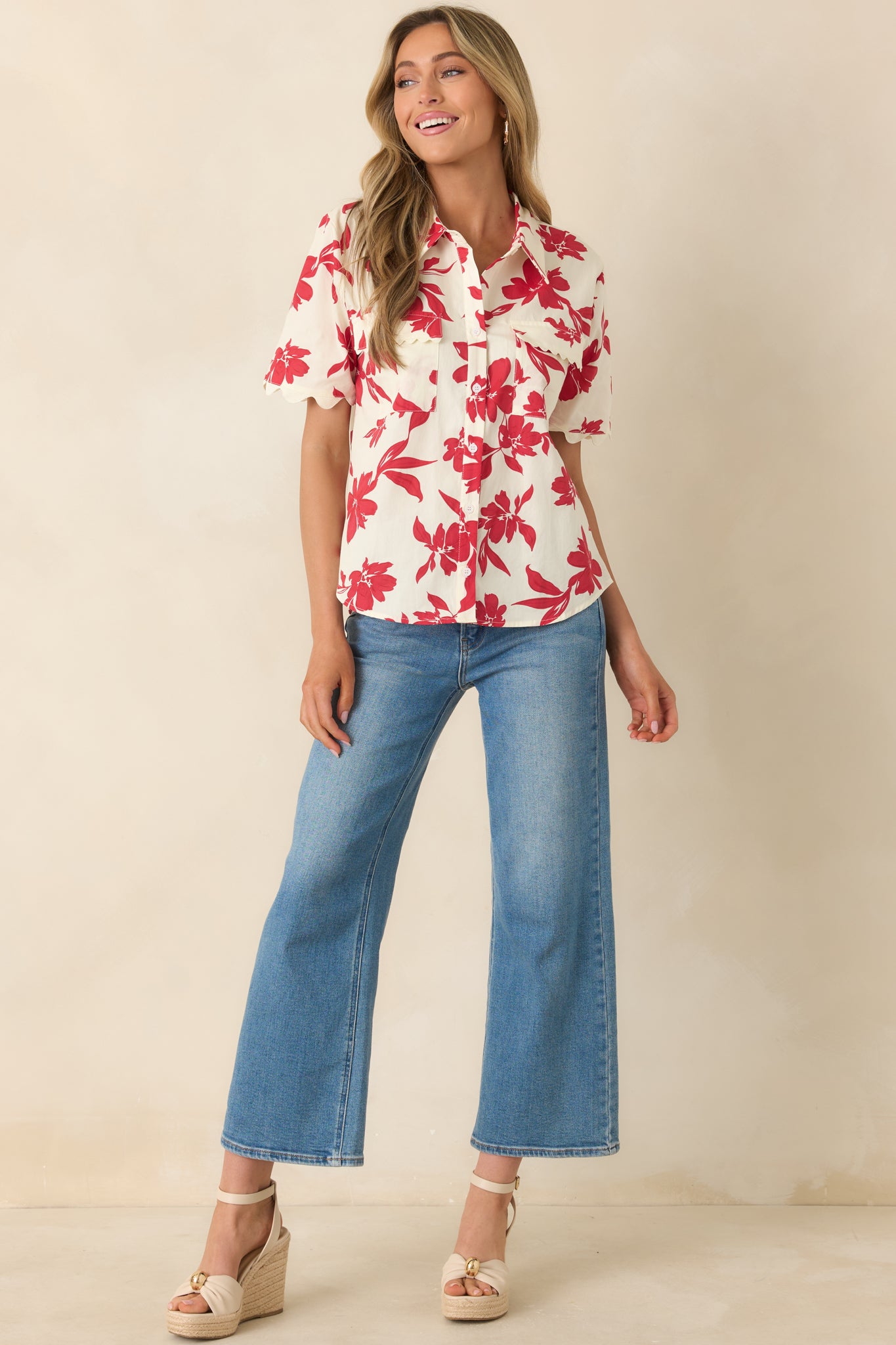 Red floral print cotton top featuring a classic collar and front buttons.