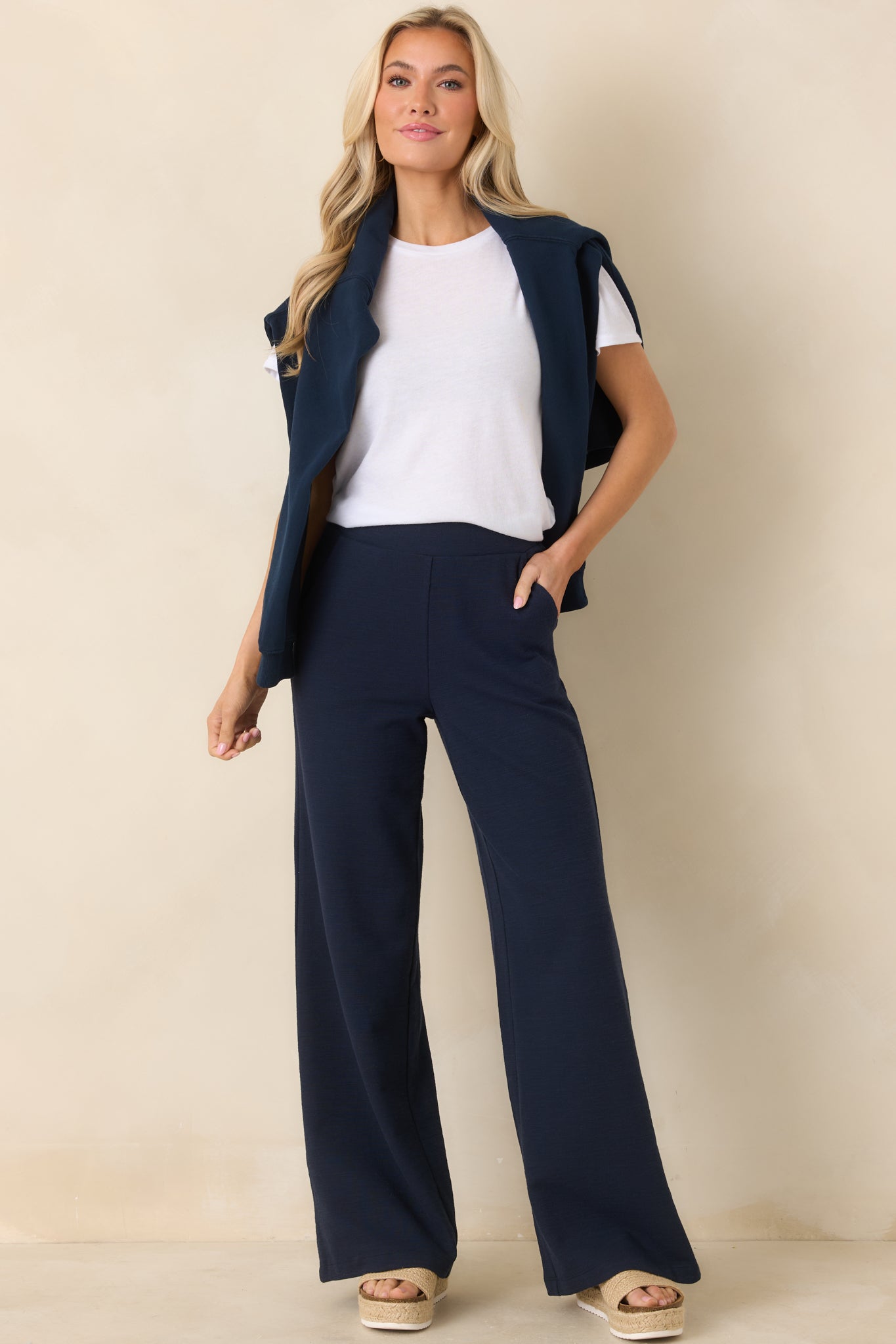 Front view of white short sleeve tee highlighting crew neckline and relaxed silhouette.