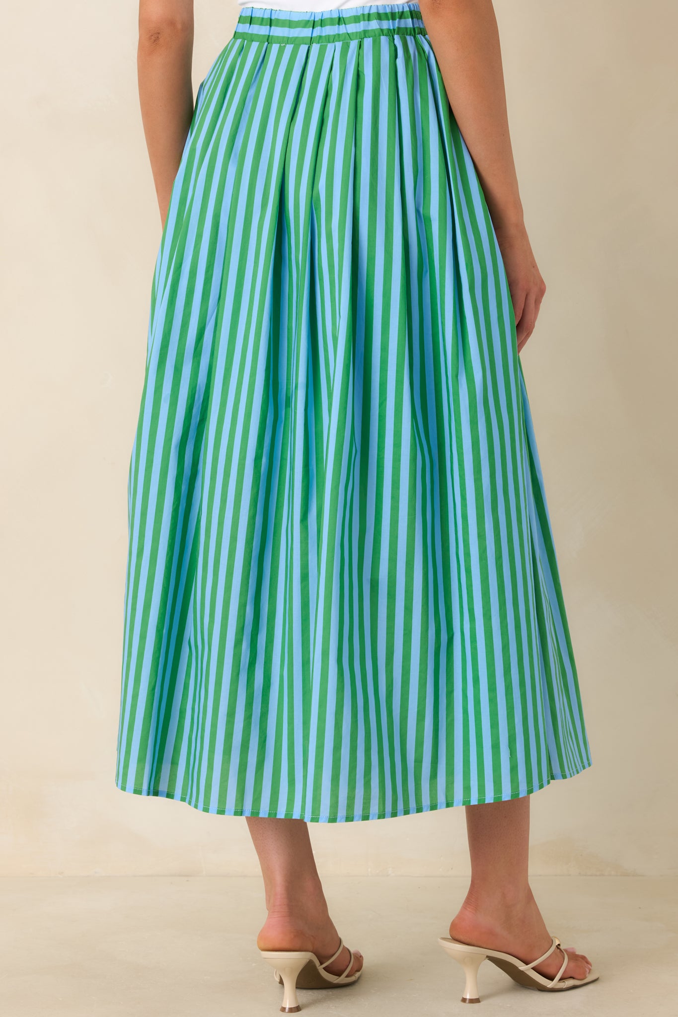 Back view of the maxi skirt showing the elasticized waistband and gently flared A-line silhouette.