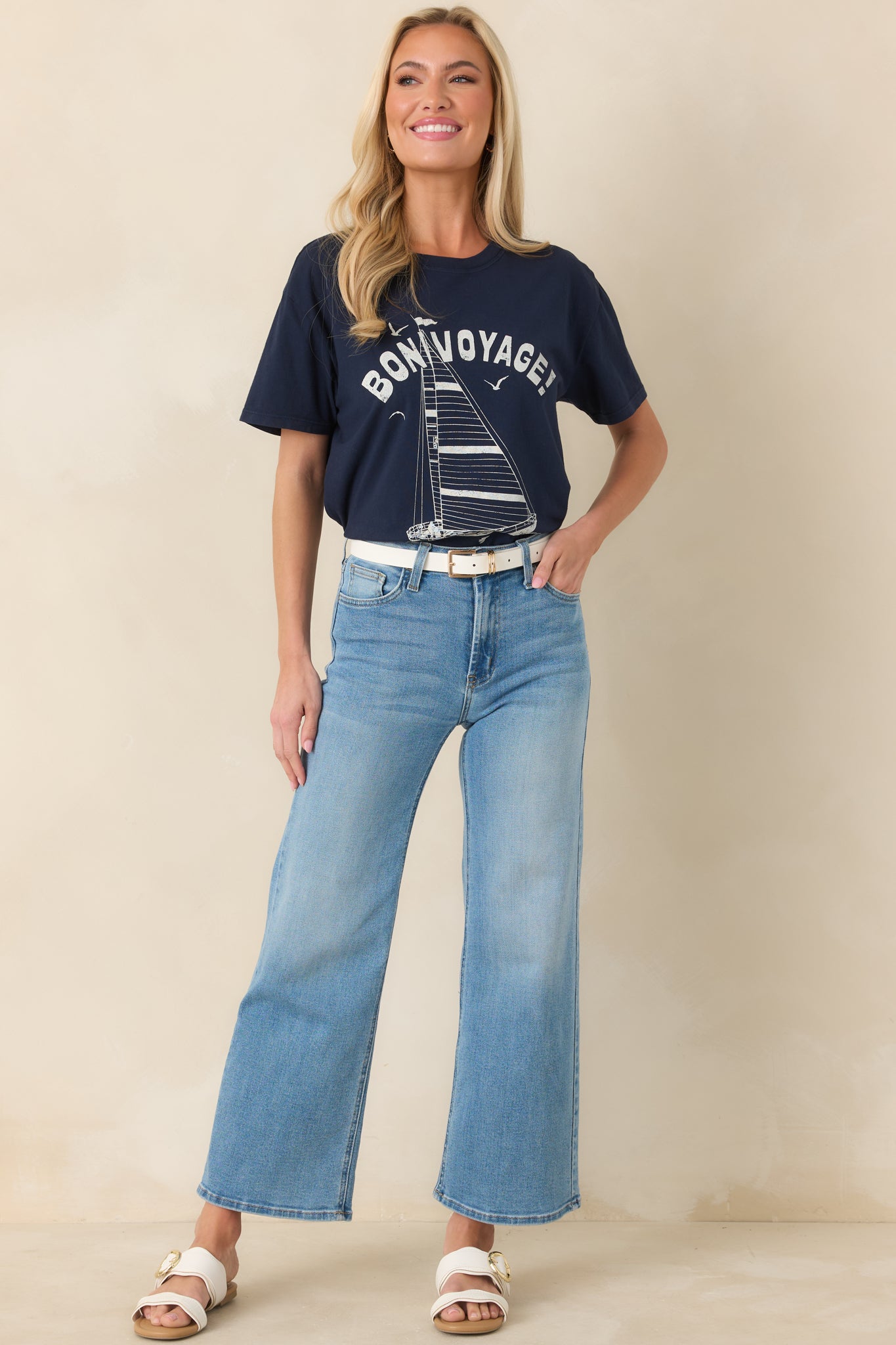 Relaxed-fit navy tee with short sleeves, straight hemline, and a casual, versatile cut suitable for layering or wearing alone.