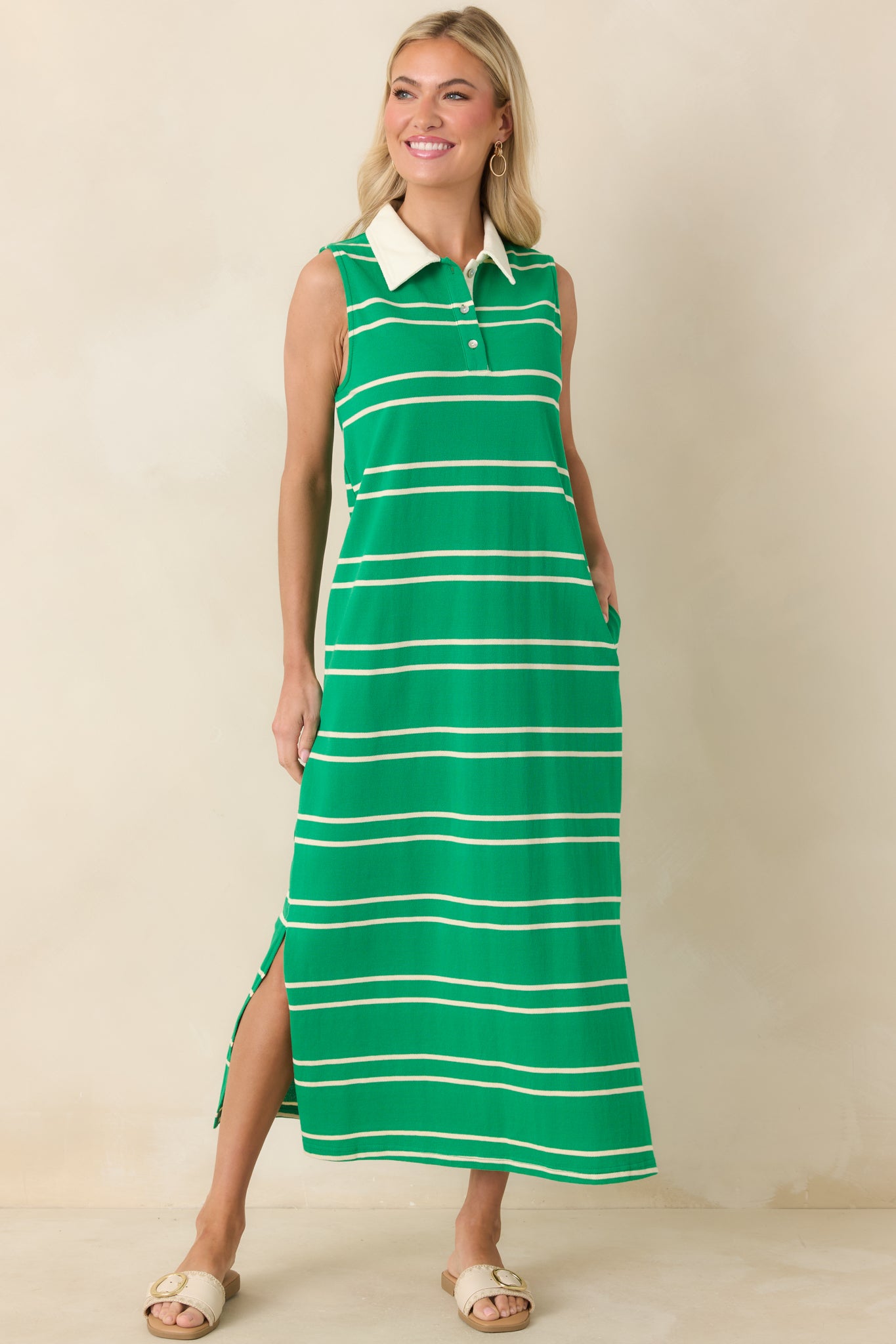 Breathable cotton maxi featuring green stripes, a tailored collar, and a flowing straight-cut silhouette for effortless movement.