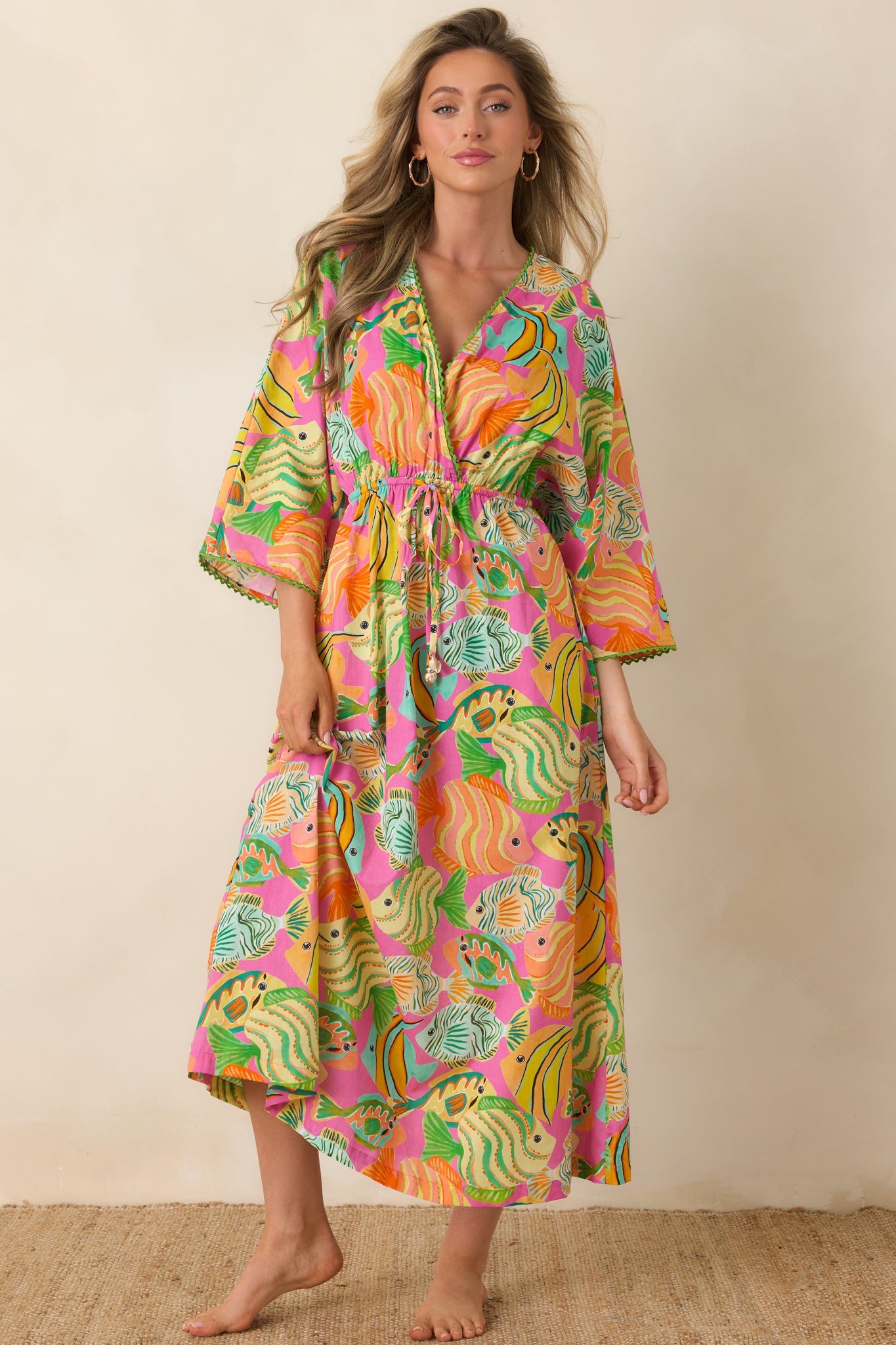 Dress with flowing silhouette, playful ocean motifs, and comfortable drawstring waist.
