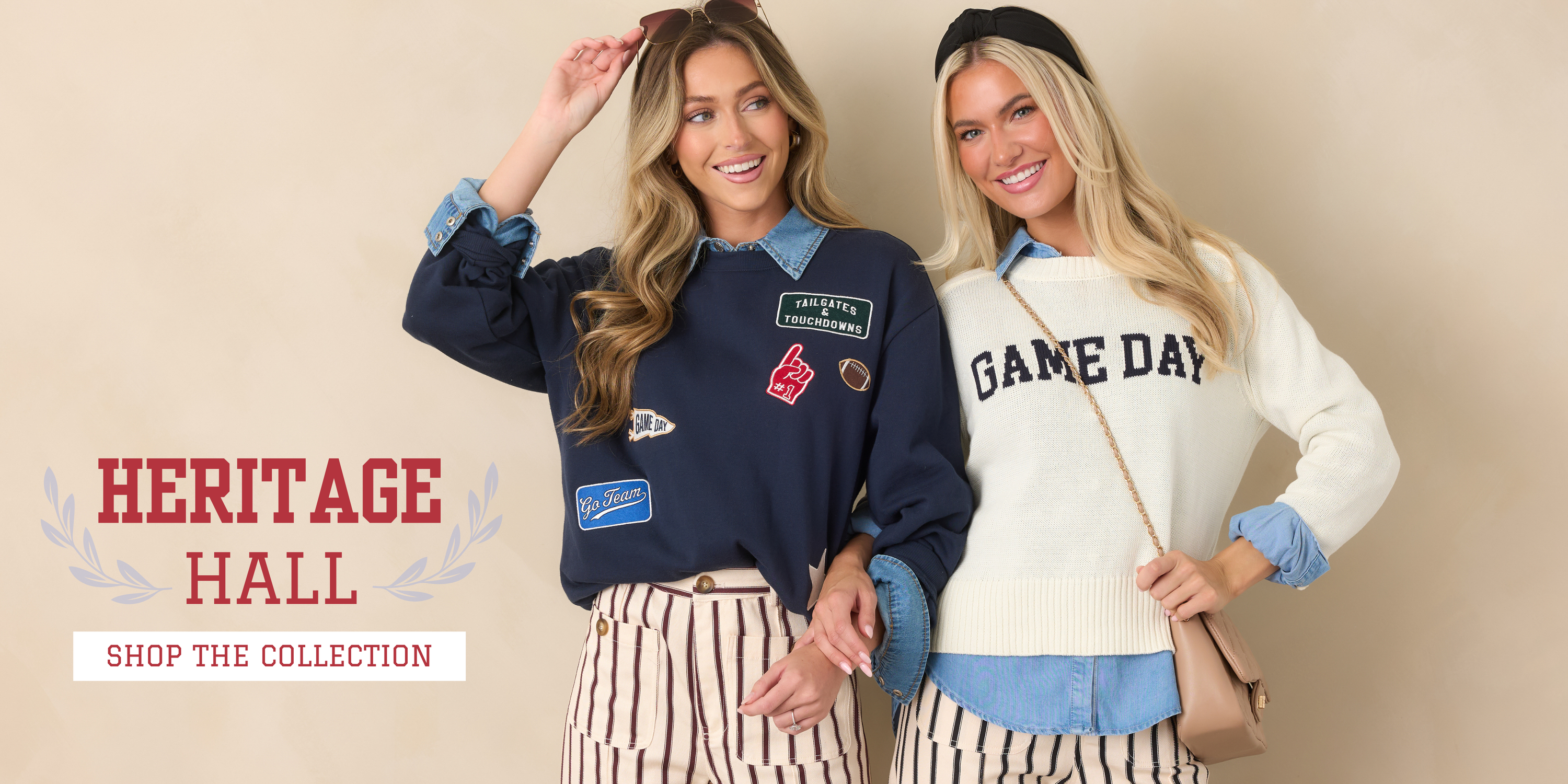 Two models wearing game day sweaters over blue undershirts & striped pants. Text reads "Heritage Hall: Shop The Collection."