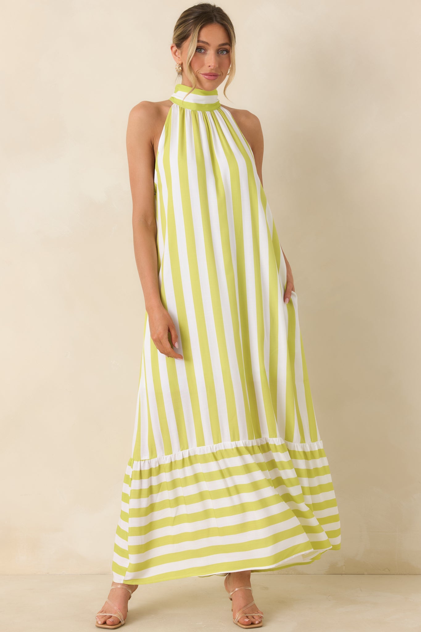 Striped halter midi dress, featuring soft gathered neckline and easy flowing shape.
