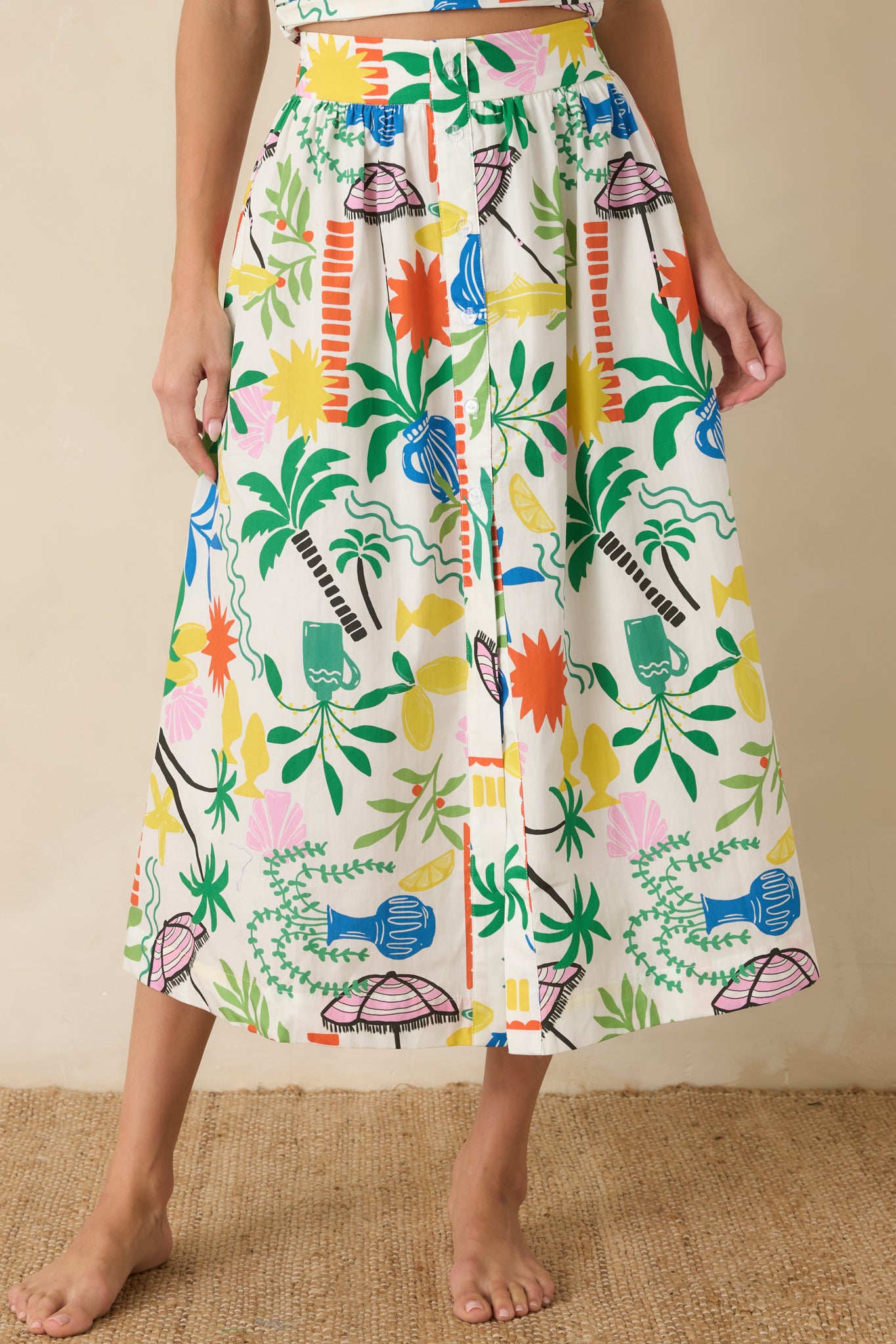 Front detail highlighting the lightweight cotton fabric, side pocket design, and flowing silhouette.